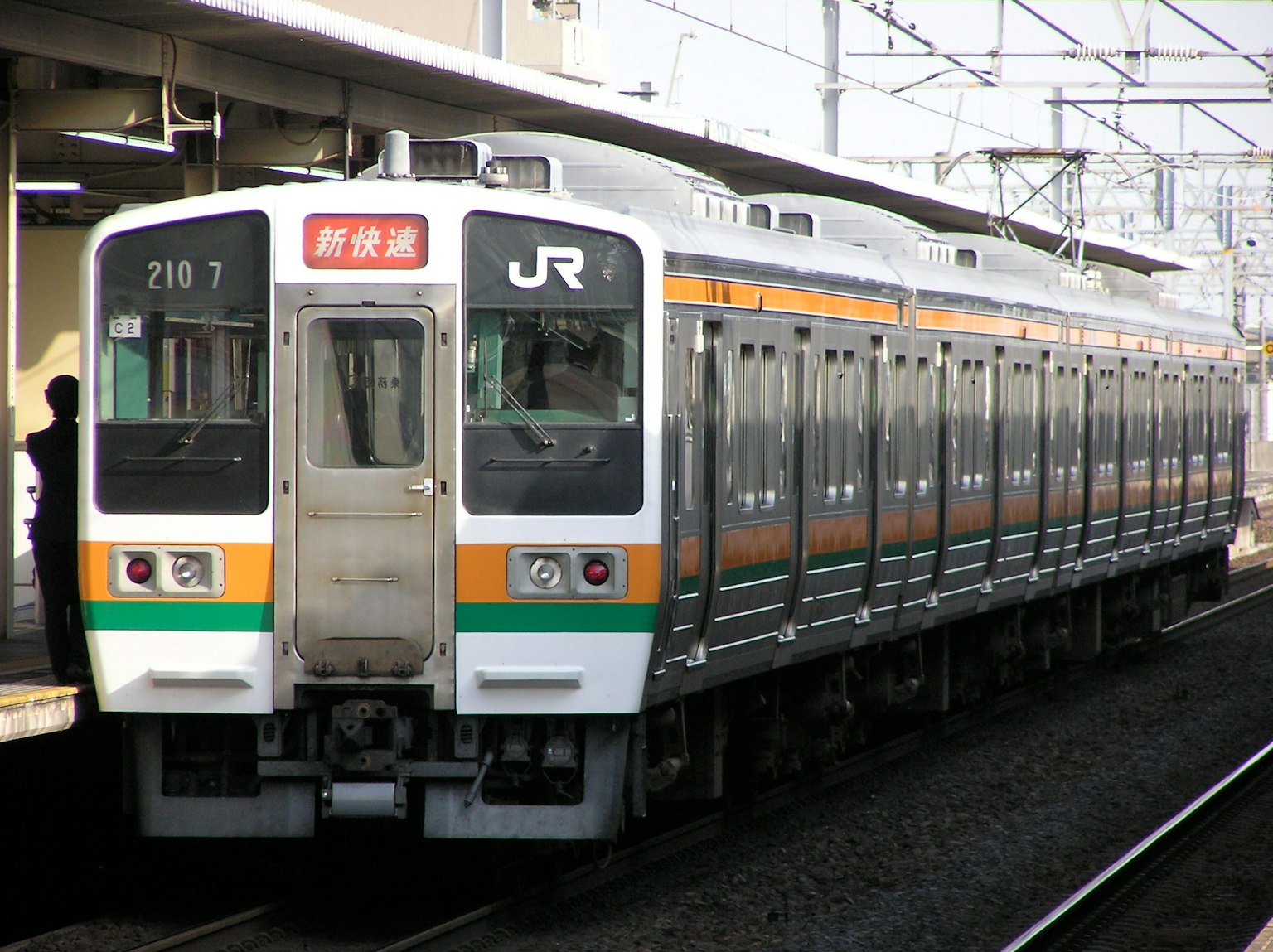 Japanese JR train stopped at a station