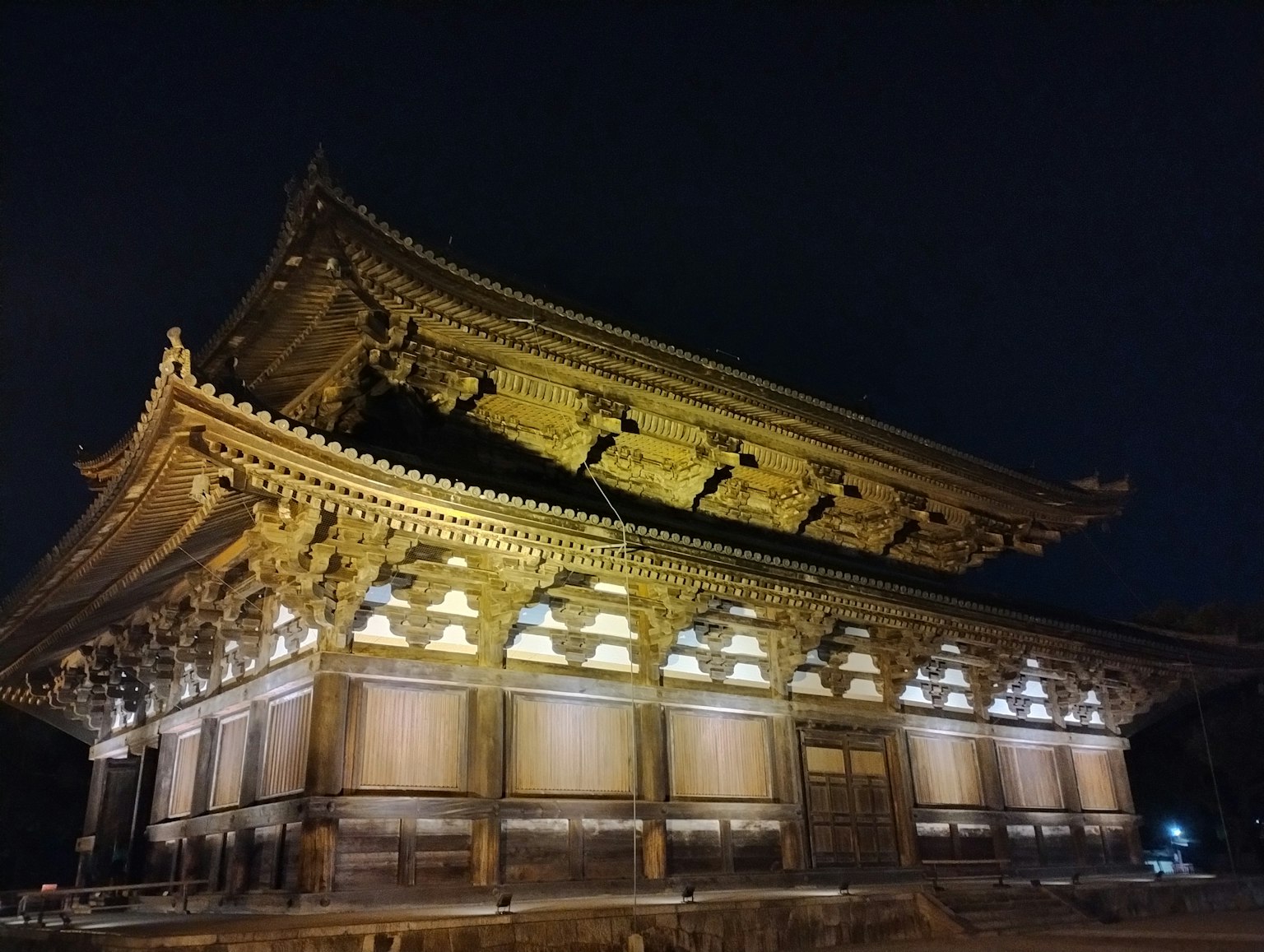 Traditional architectural structure beautifully illuminated at night