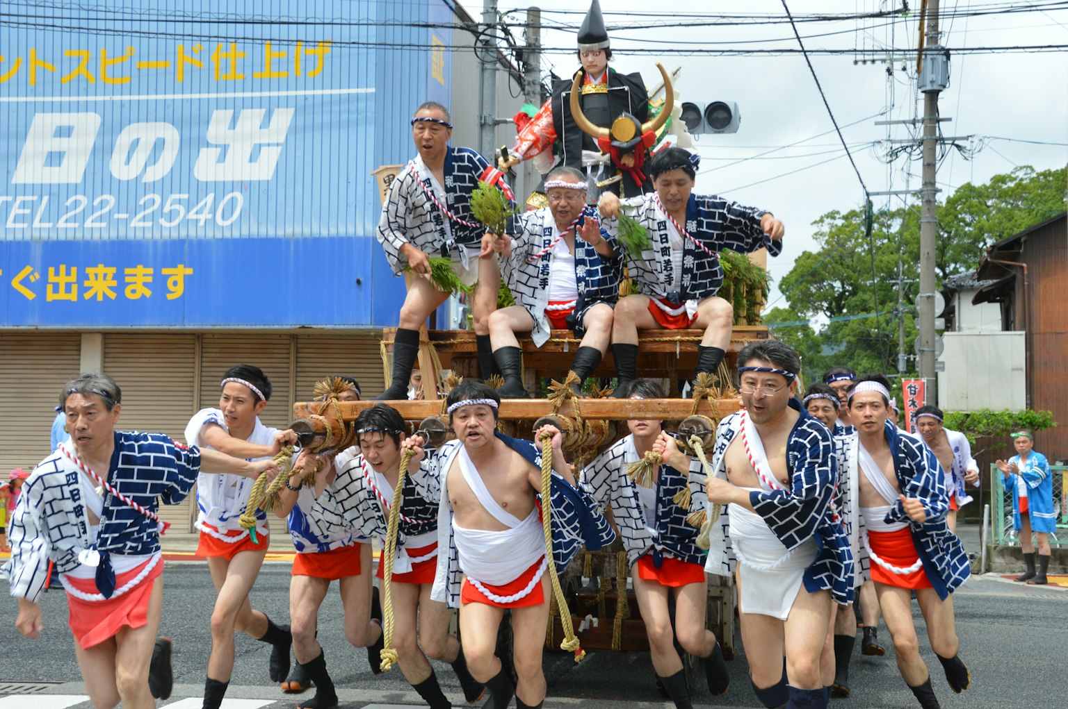 Festival participants carrying a portable shrine