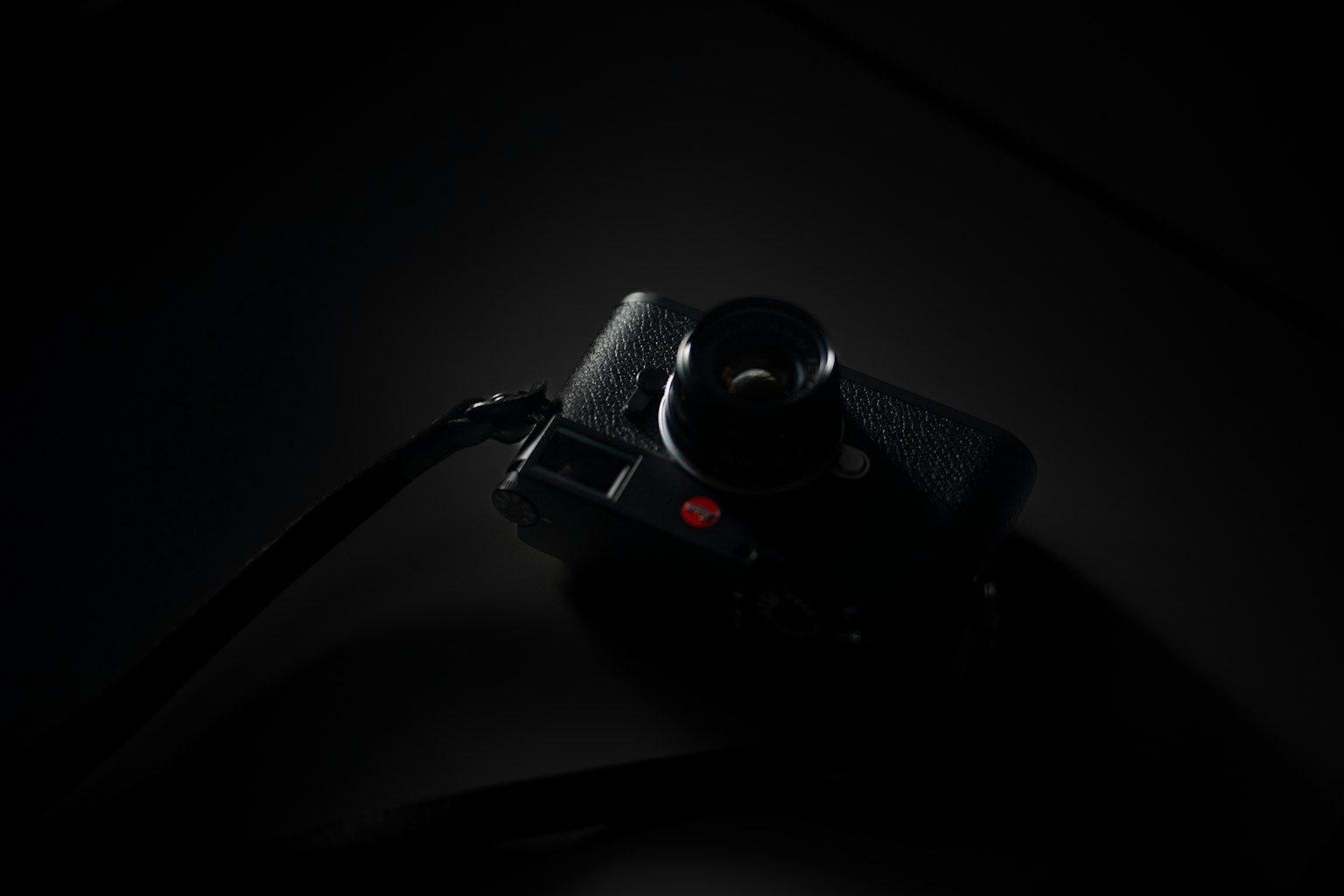 Image of a camera in dim lighting with shadows