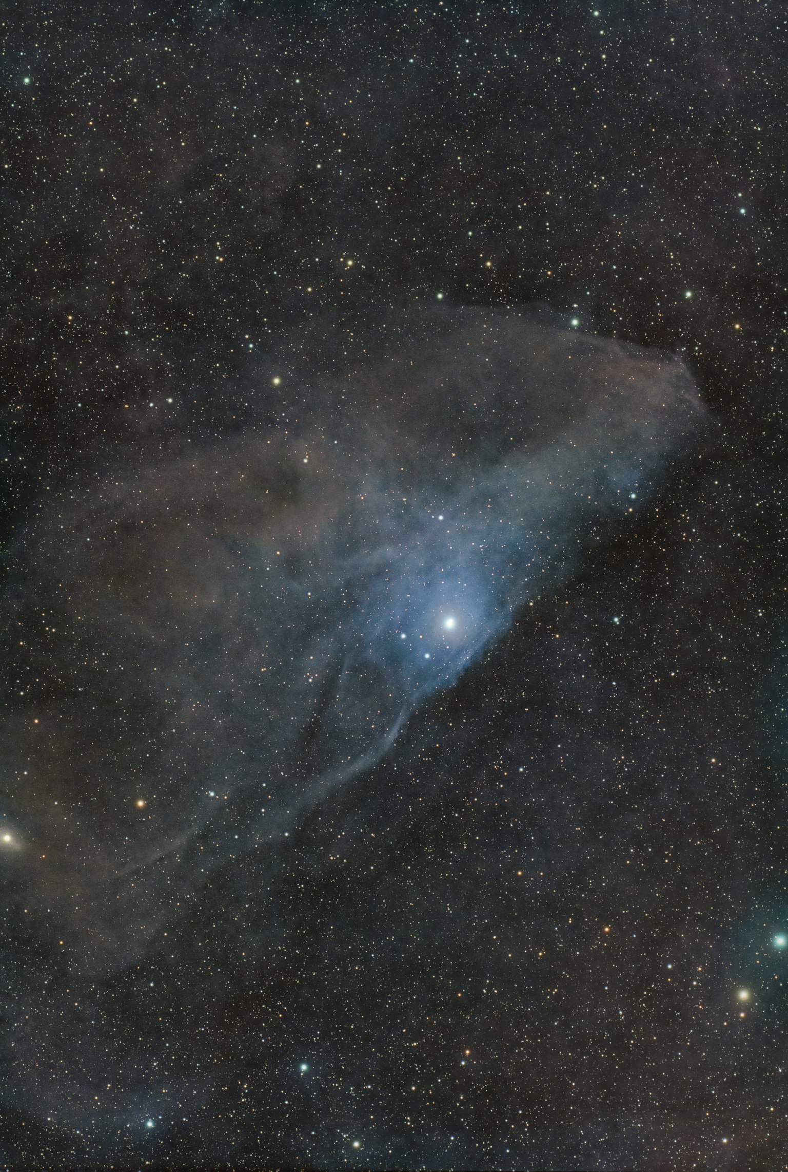 Bild einer Nebel mit einem hellblauen Stern