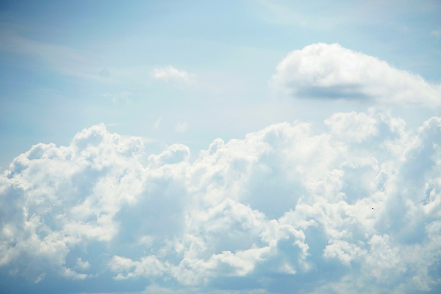 White clouds floating in a blue sky