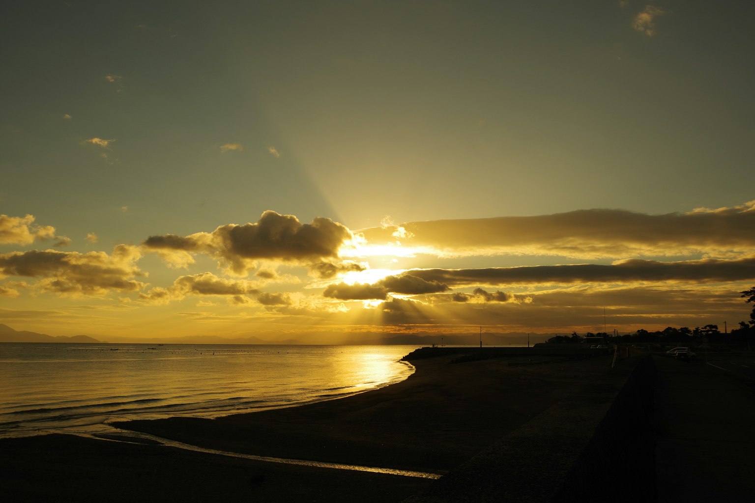 Beautiful coastal landscape at sunset with calm waves