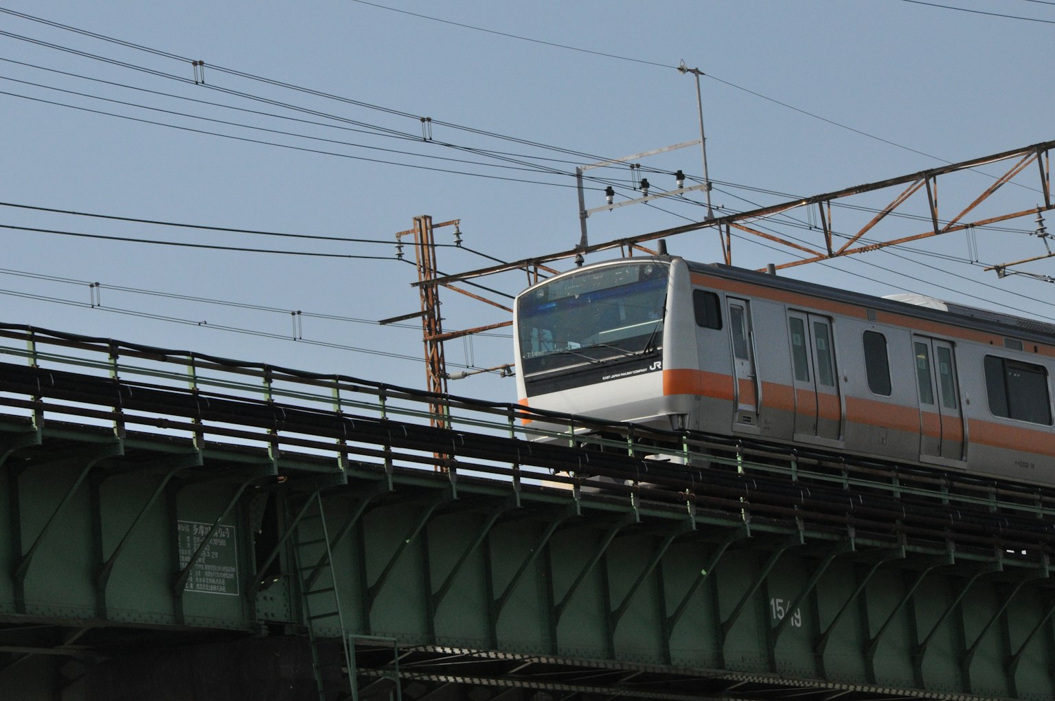 Train traveling on an elevated bridge
