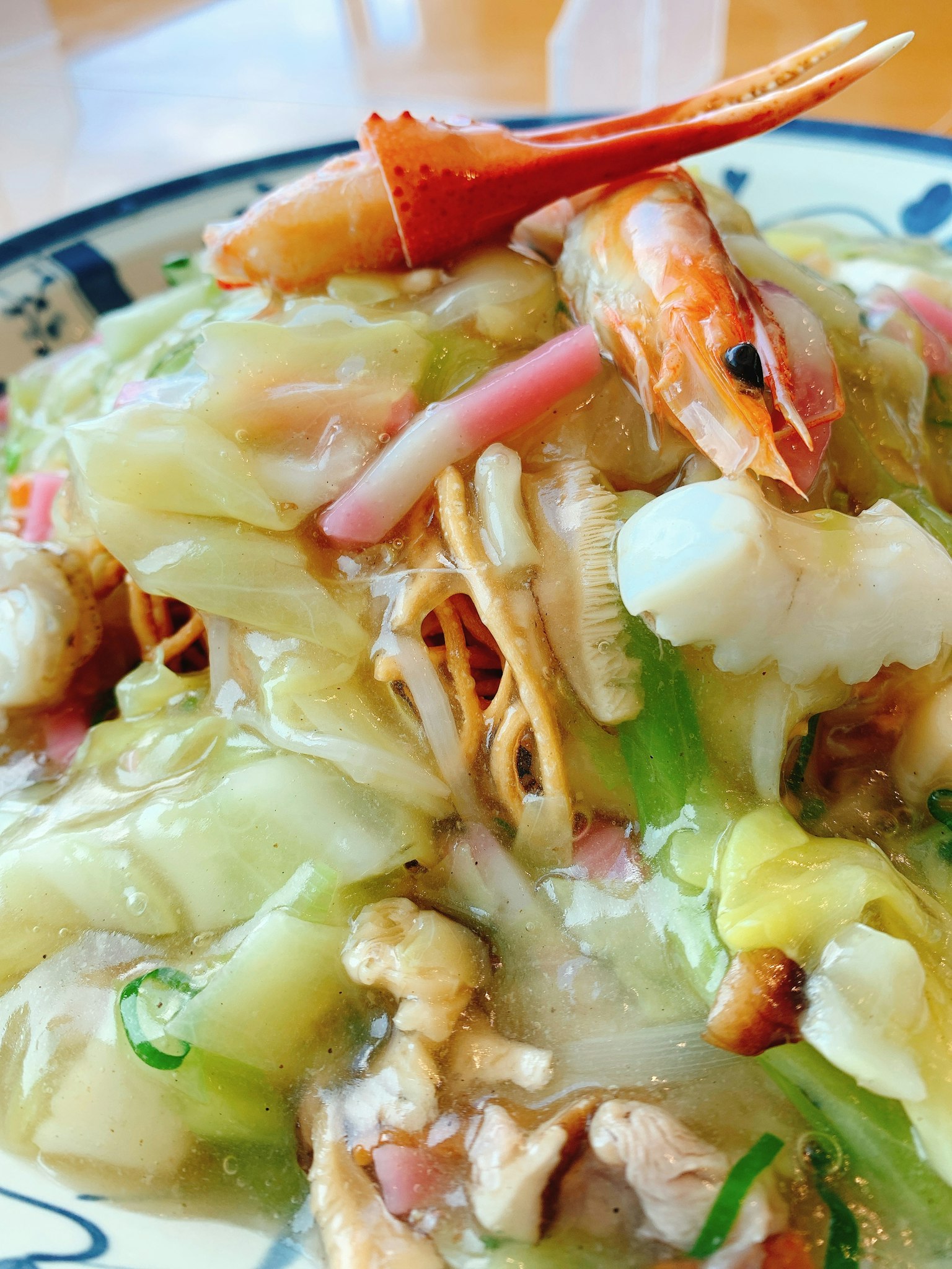 Close-up of shrimp and cabbage stir-fried noodles dish
