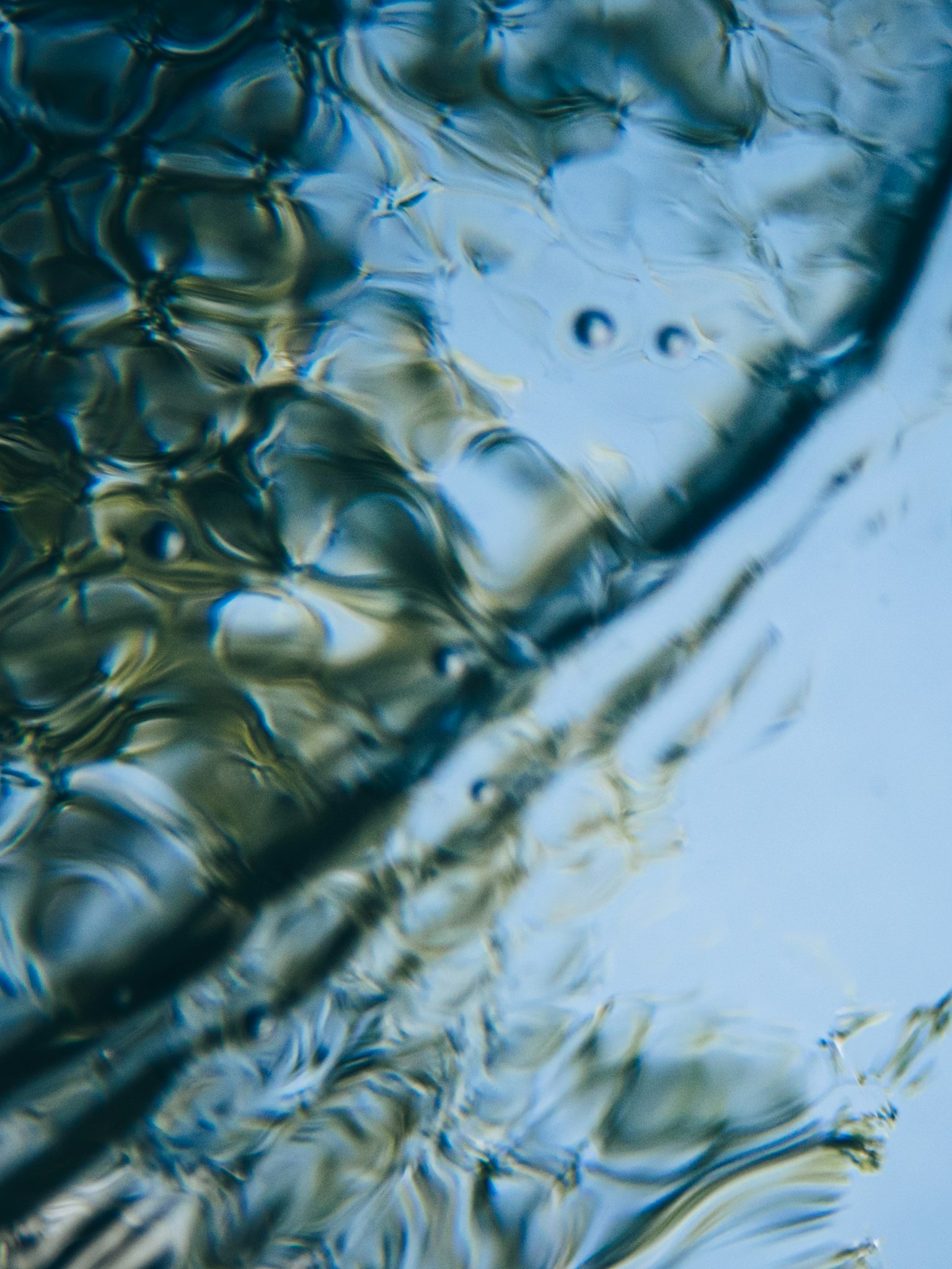 Abstract image of flowing water with beautiful light reflections