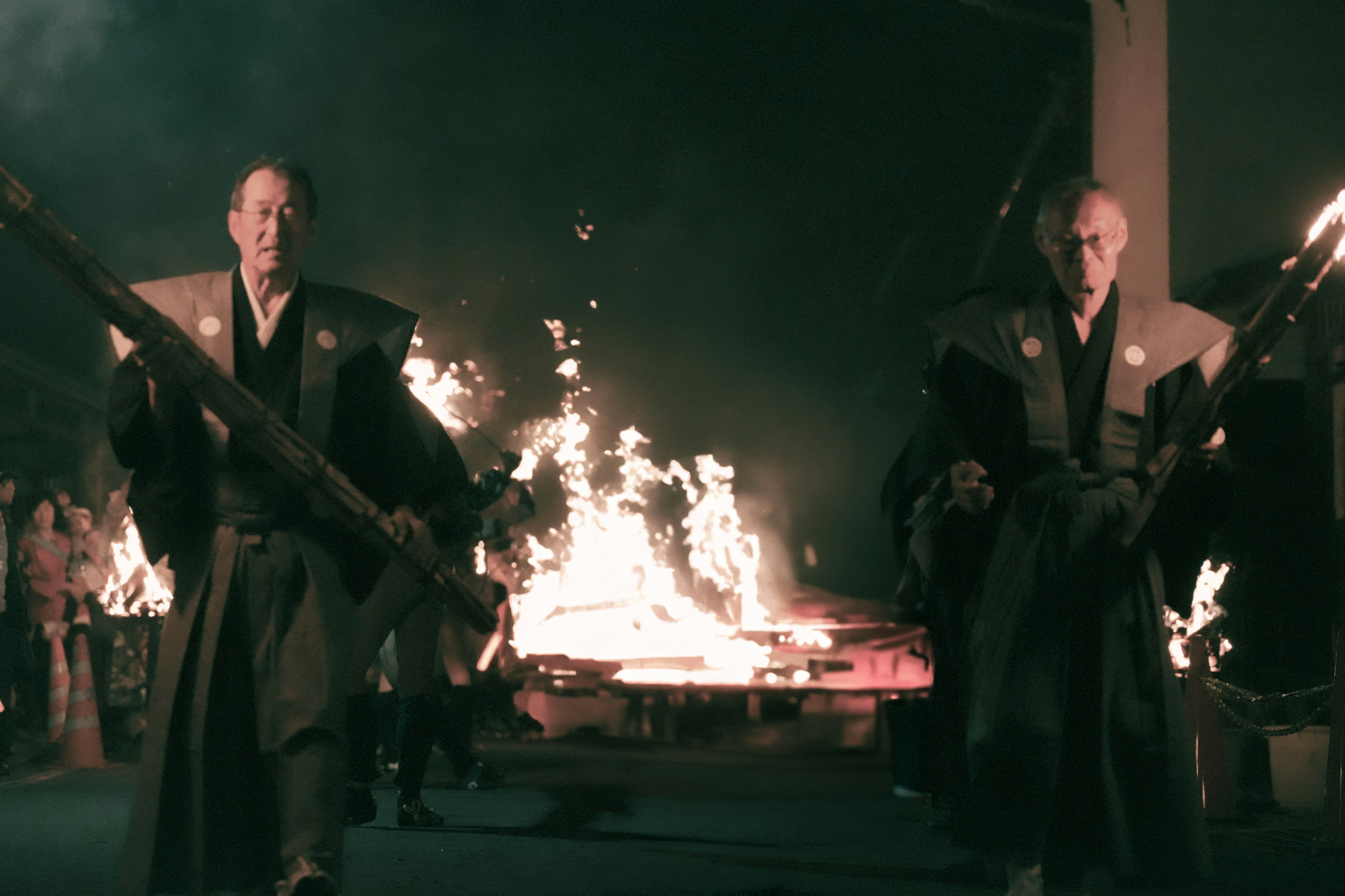 Karuma Fire Festival night procession with torches blazing