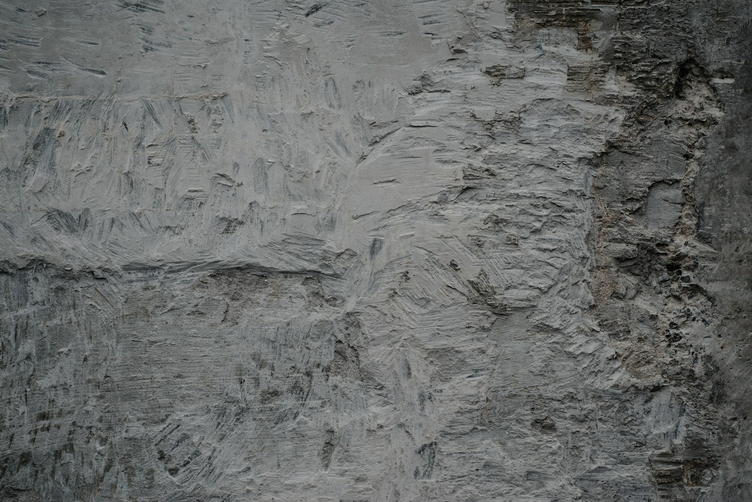 Superficie murale grigia con texture ruvida
