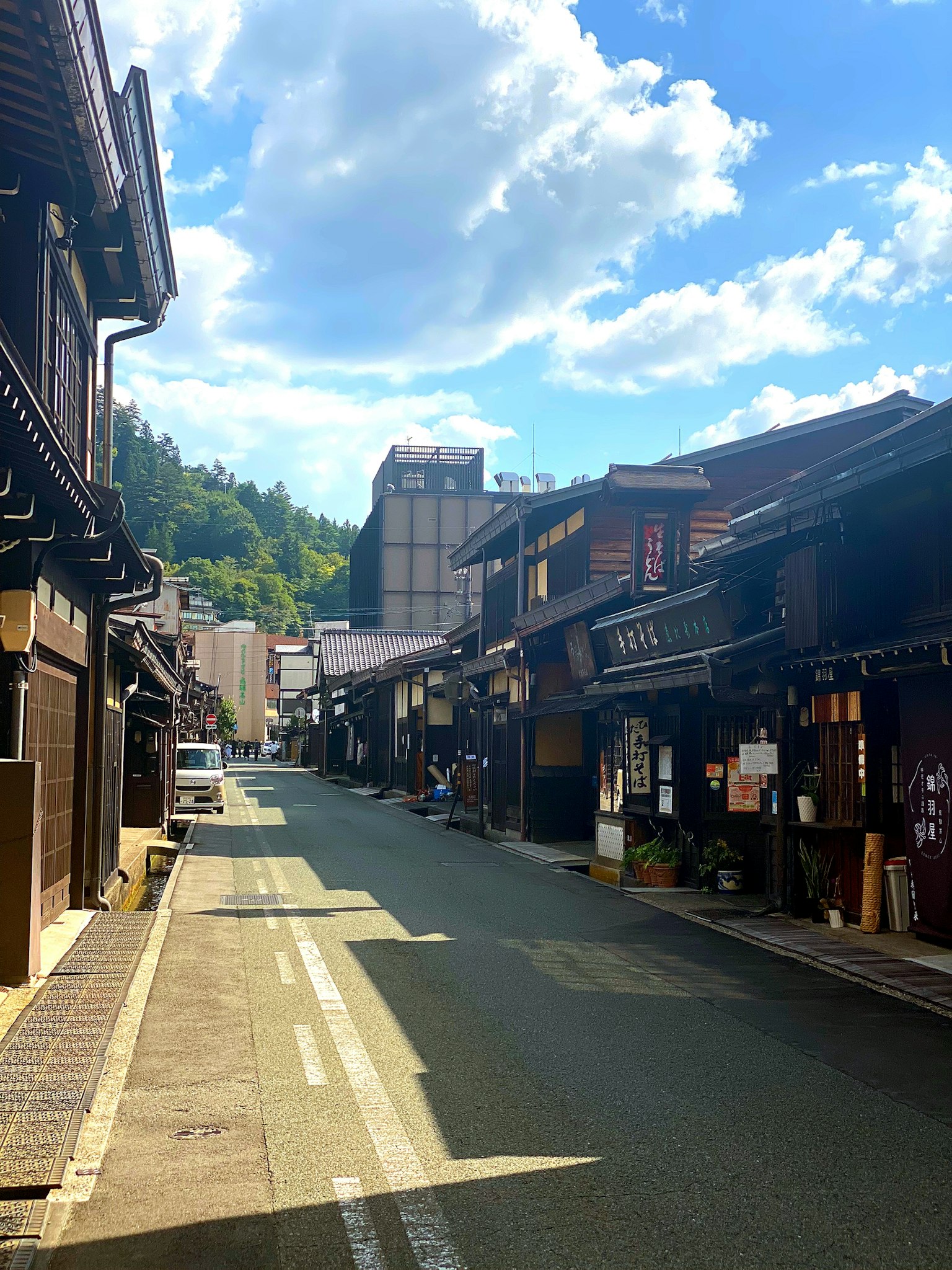 Quiet street featuring traditional Japanese architecture