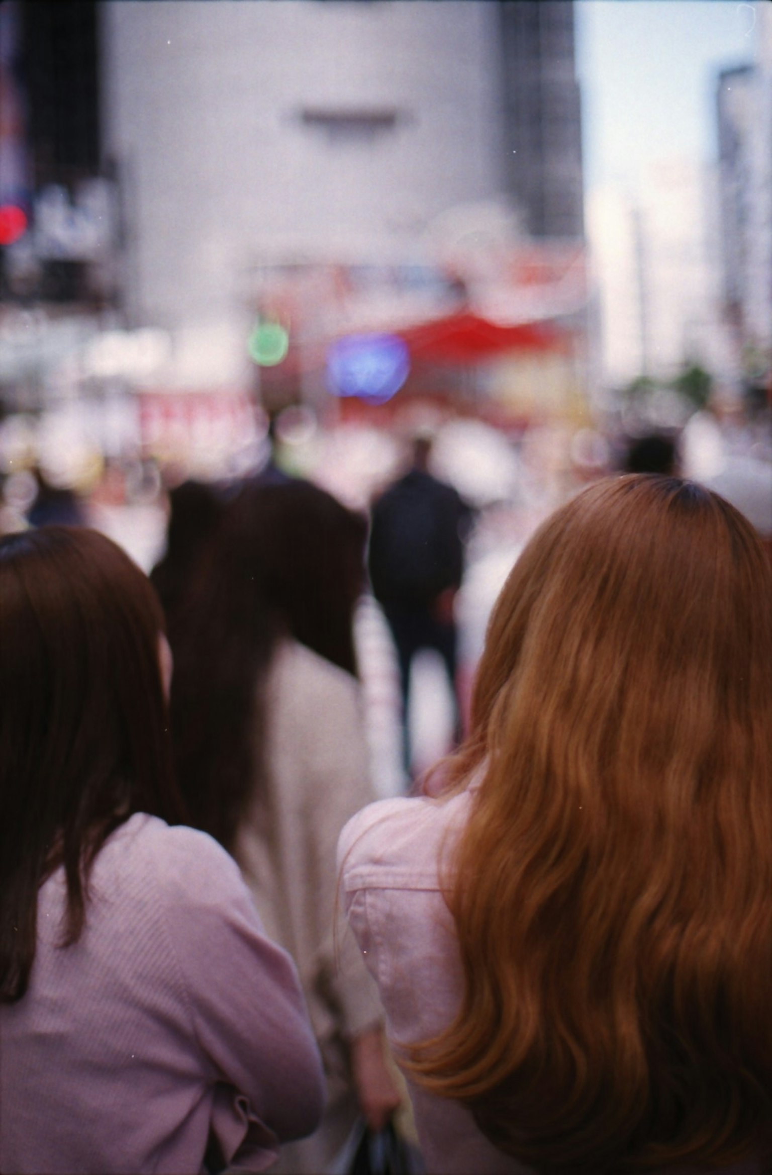 Image capturing people crossing an intersection from behind