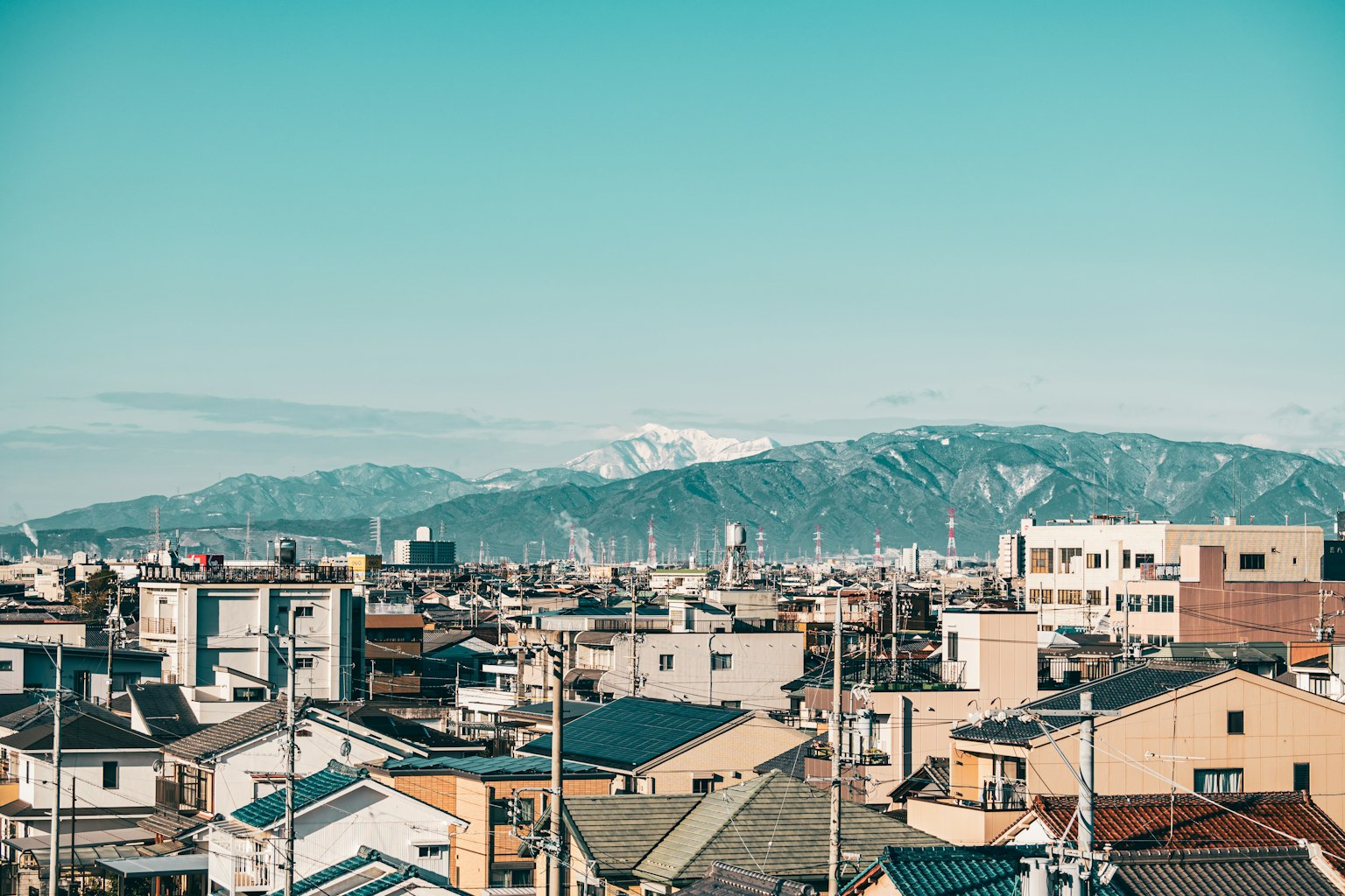 Urban landscape with mountains in the background