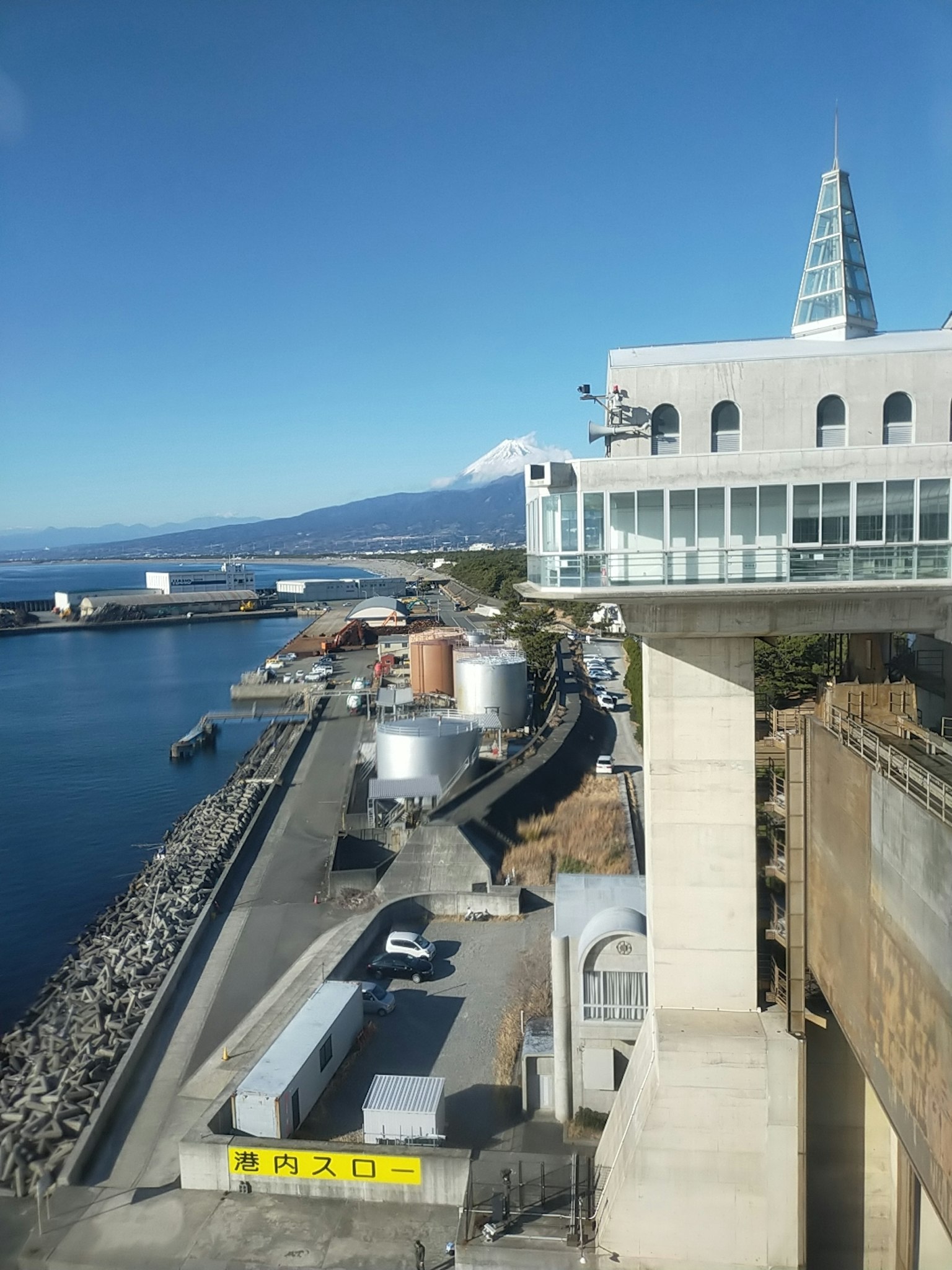 View of a port with distant Mount Fuji