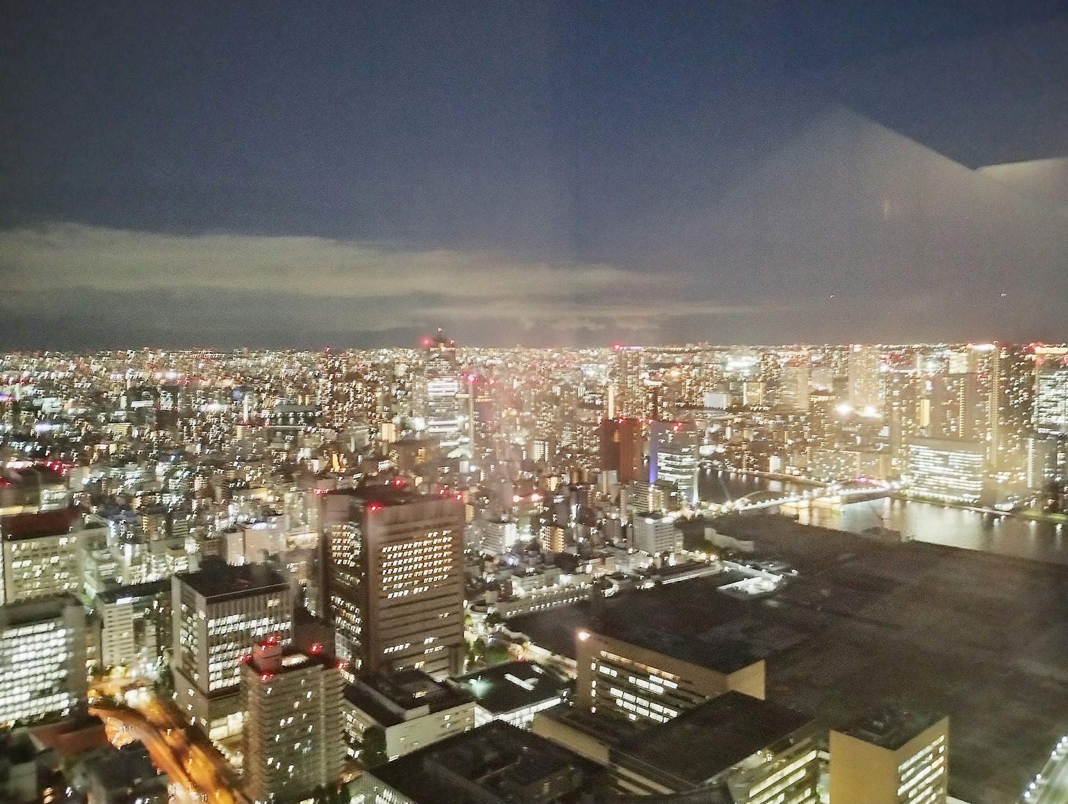 Tokyo cityscape at night with illuminated skyscrapers