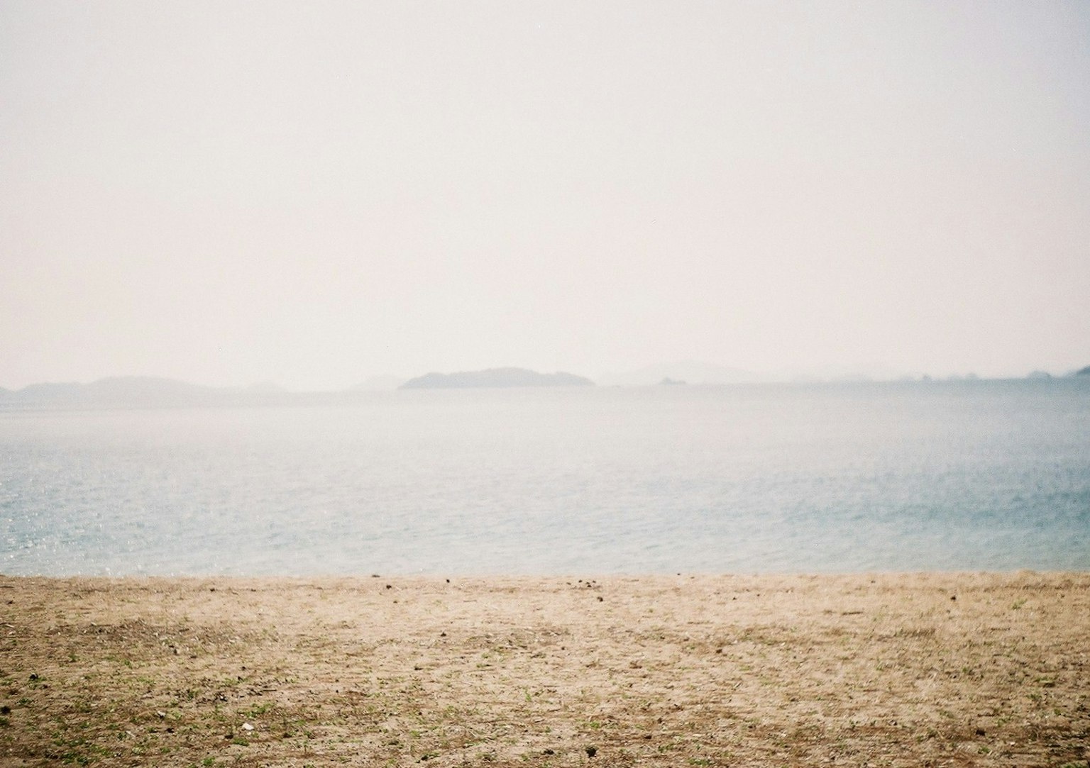 Serene view of the sea and sandy beach
