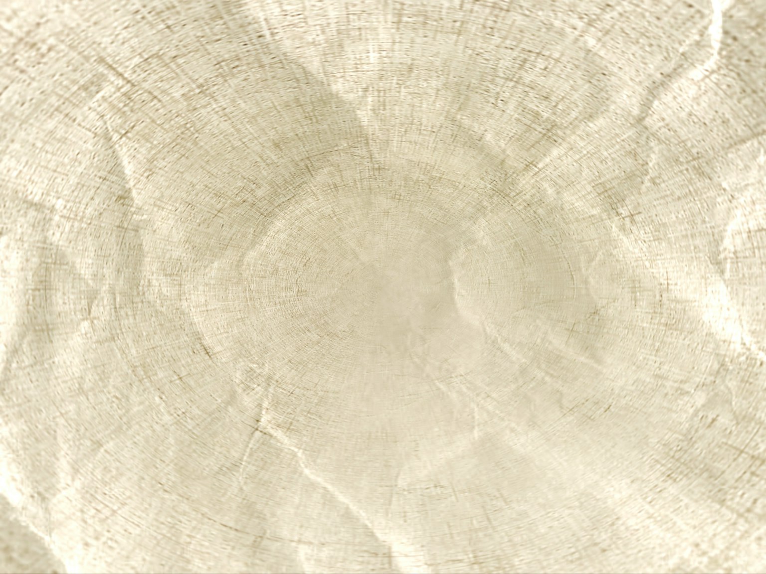 Wrinkled cream-colored fabric texture