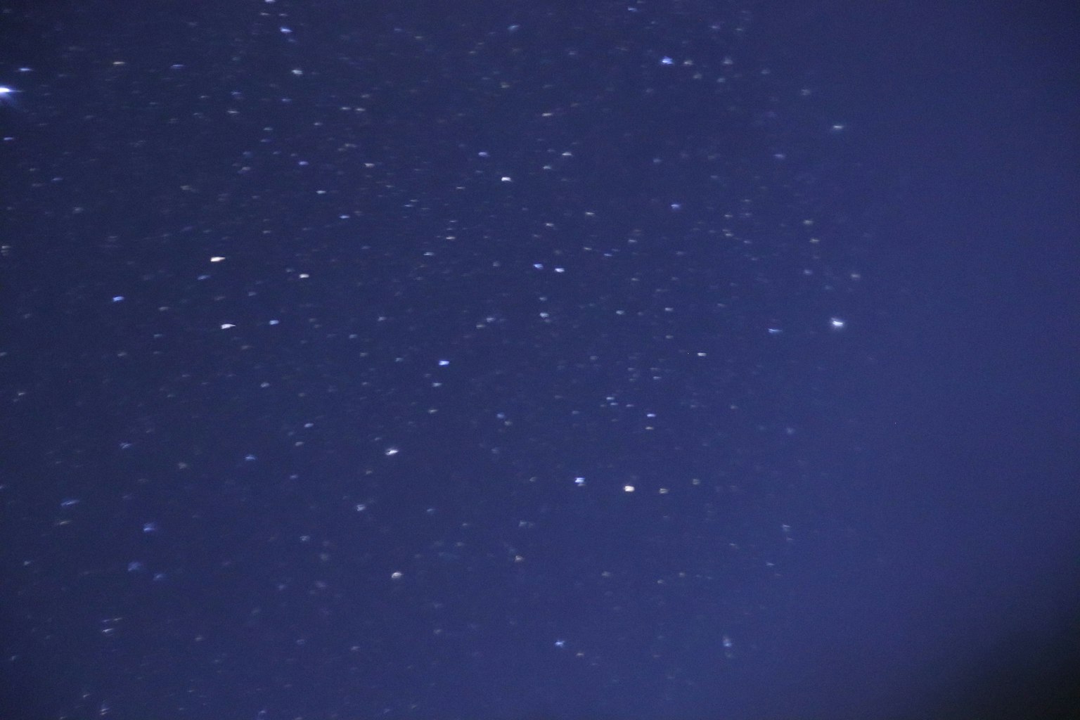 Scattered stars in a night sky