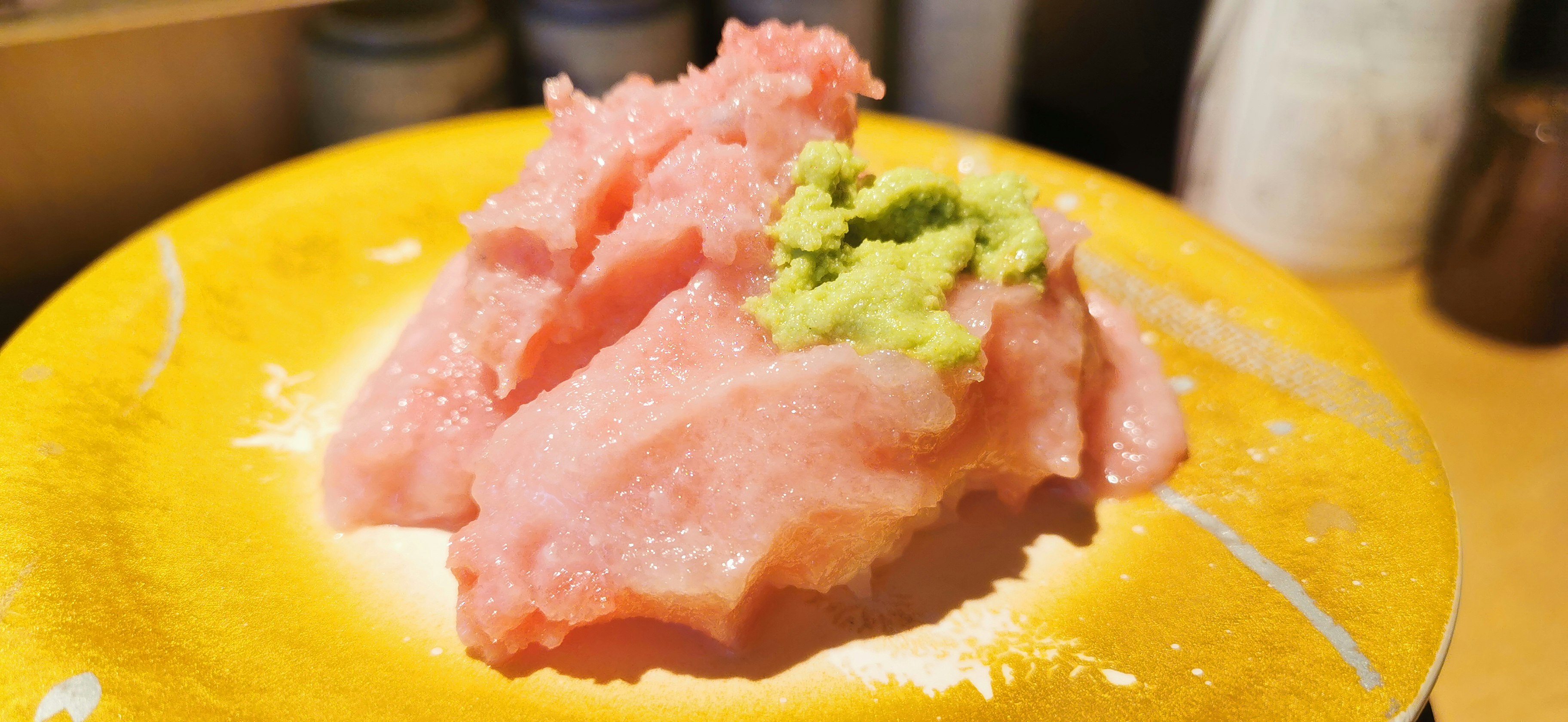 tuna sashimi on a yellow plate