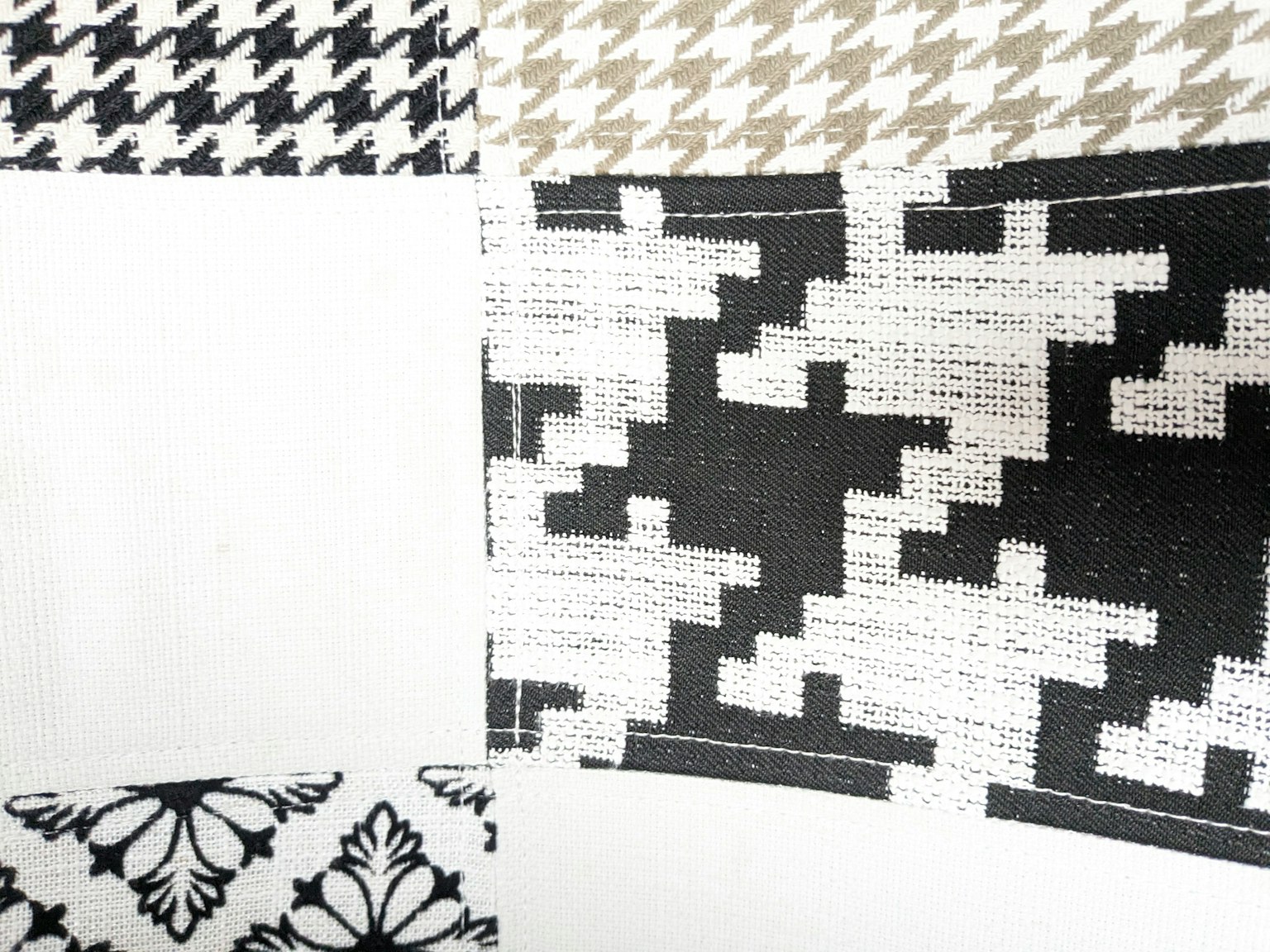 A collage of various monochrome fabric patterns