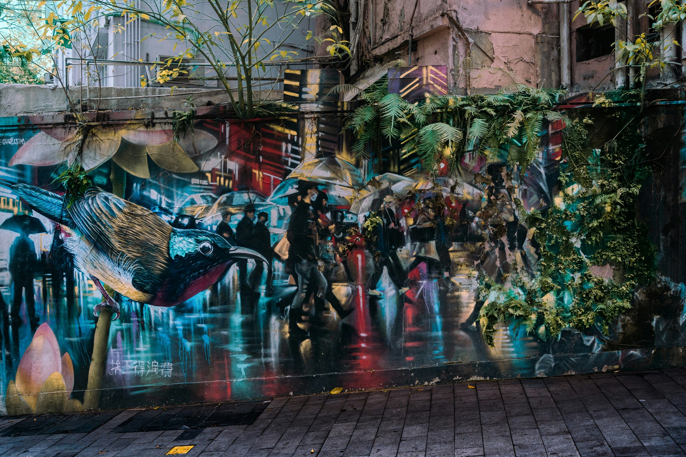 murale di Hong Kong e vivace vicolo con persone