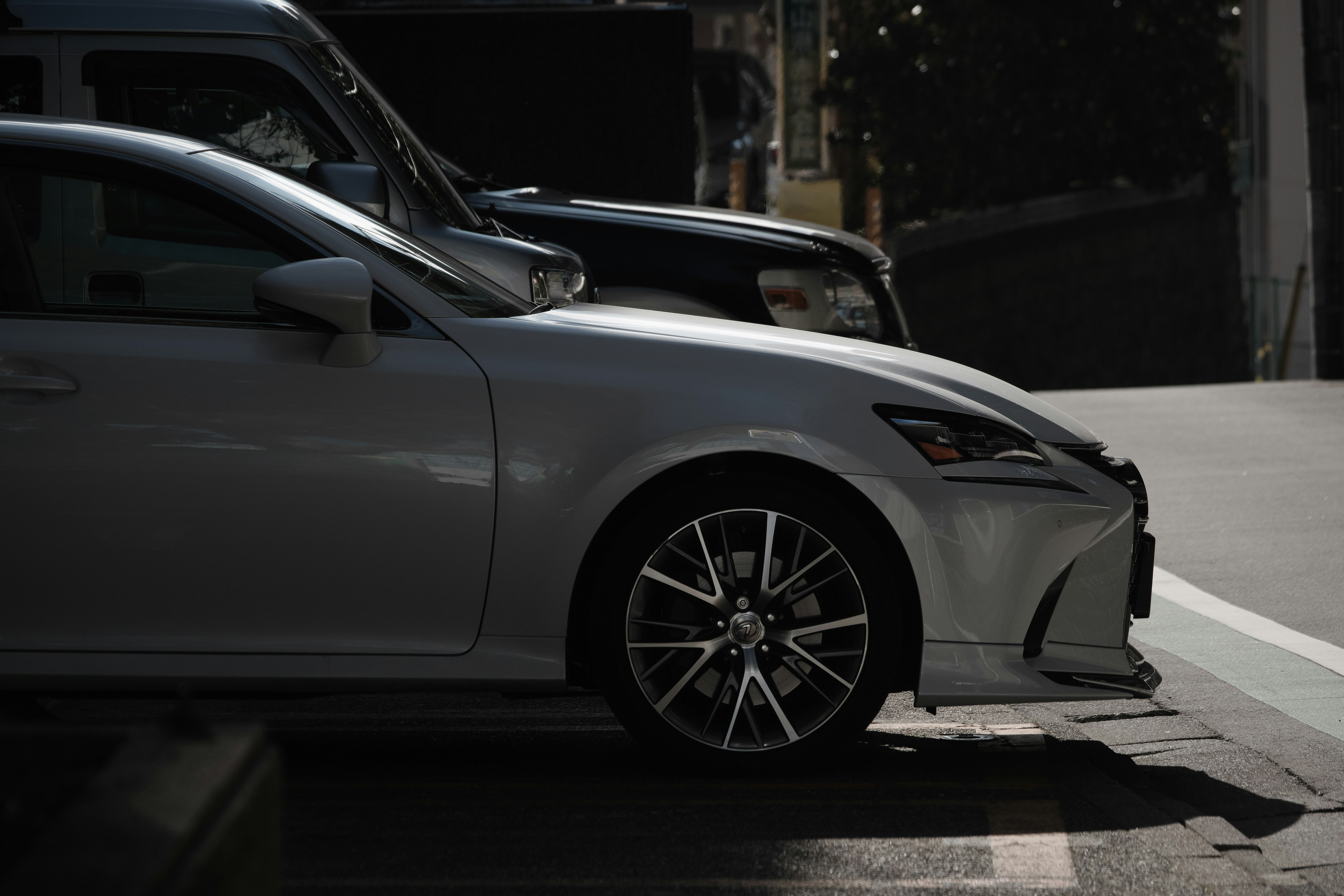 front view of a Lexus car on a city street