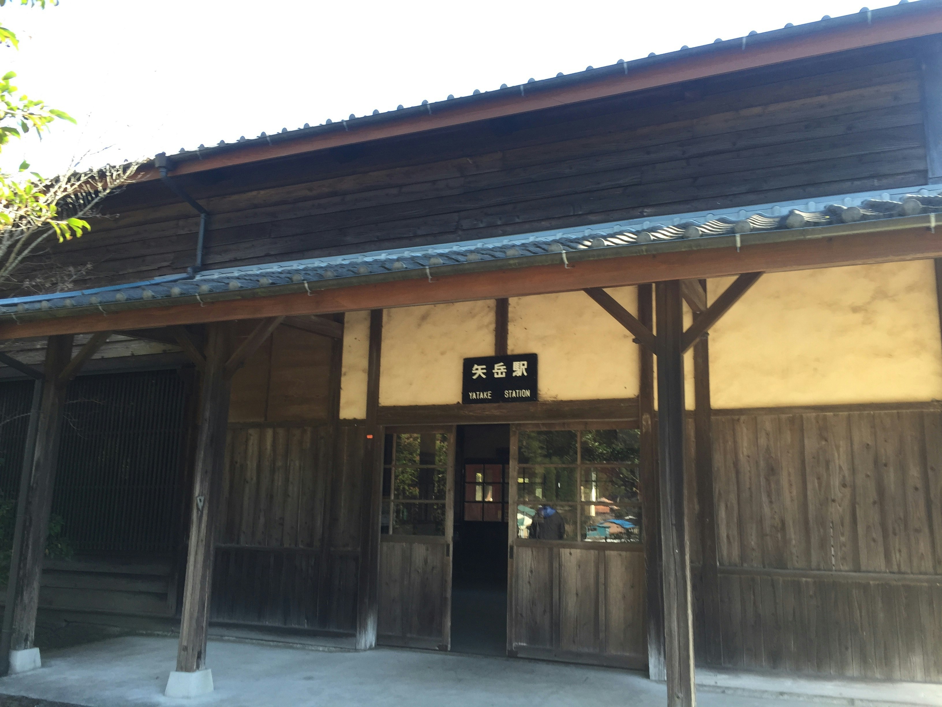 wooden station platform under the eaves