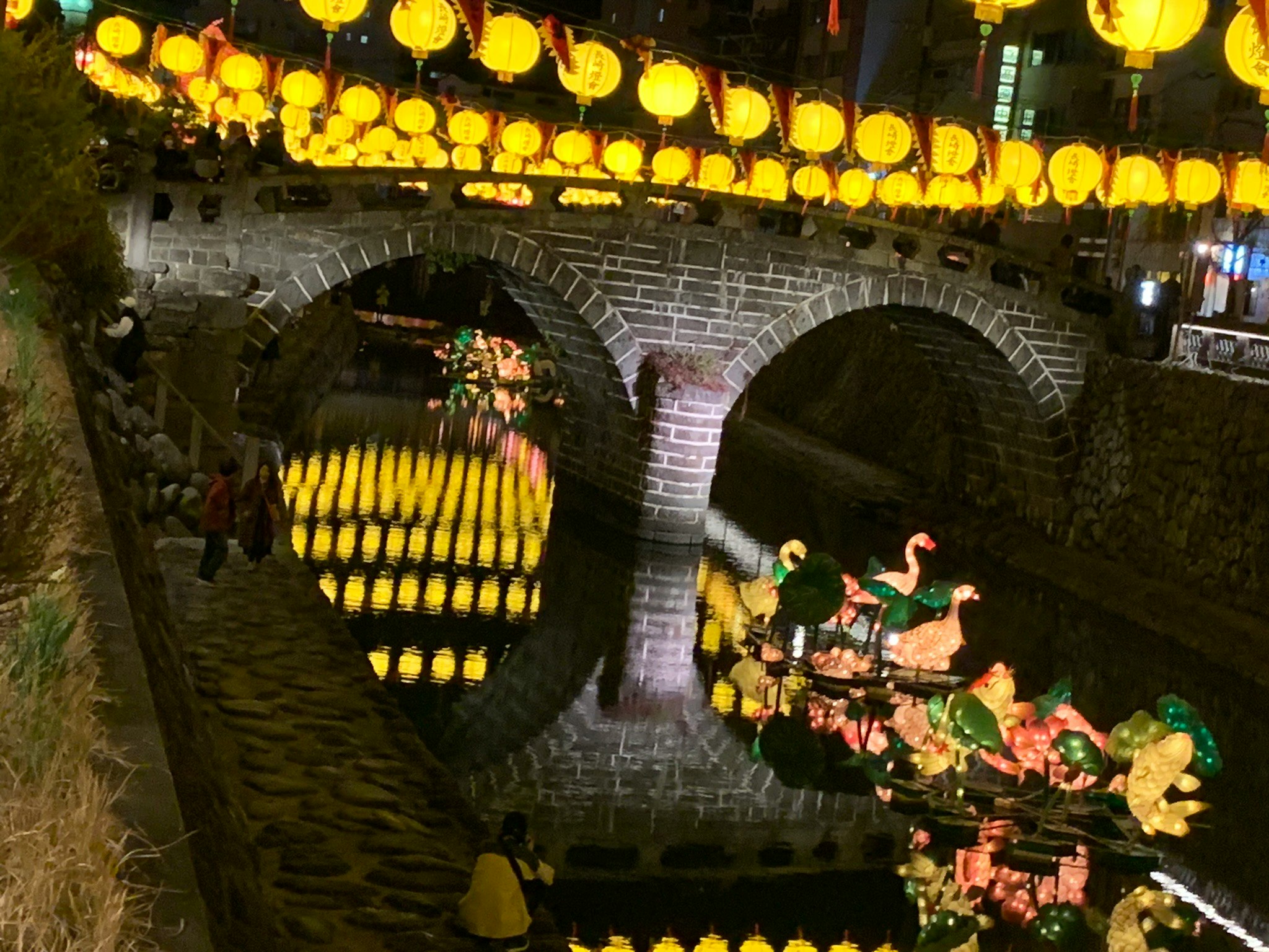 Night view of a stone alley lined with lanterns at the Nagasaki Lantern Festival