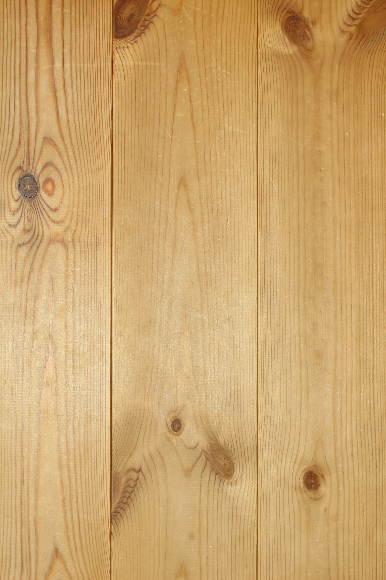 Close-up of light-colored wooden floor planks