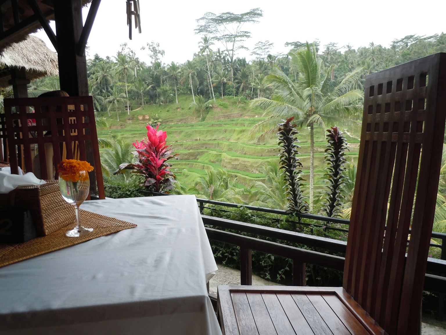 Dining table and chair overlooking a beautiful rice terrace landscape
