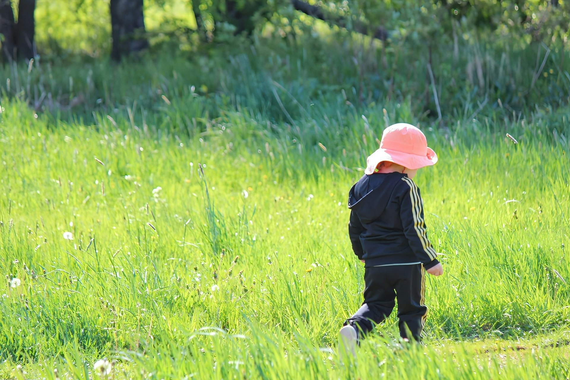 a girl walking in a Nordic spring meadow