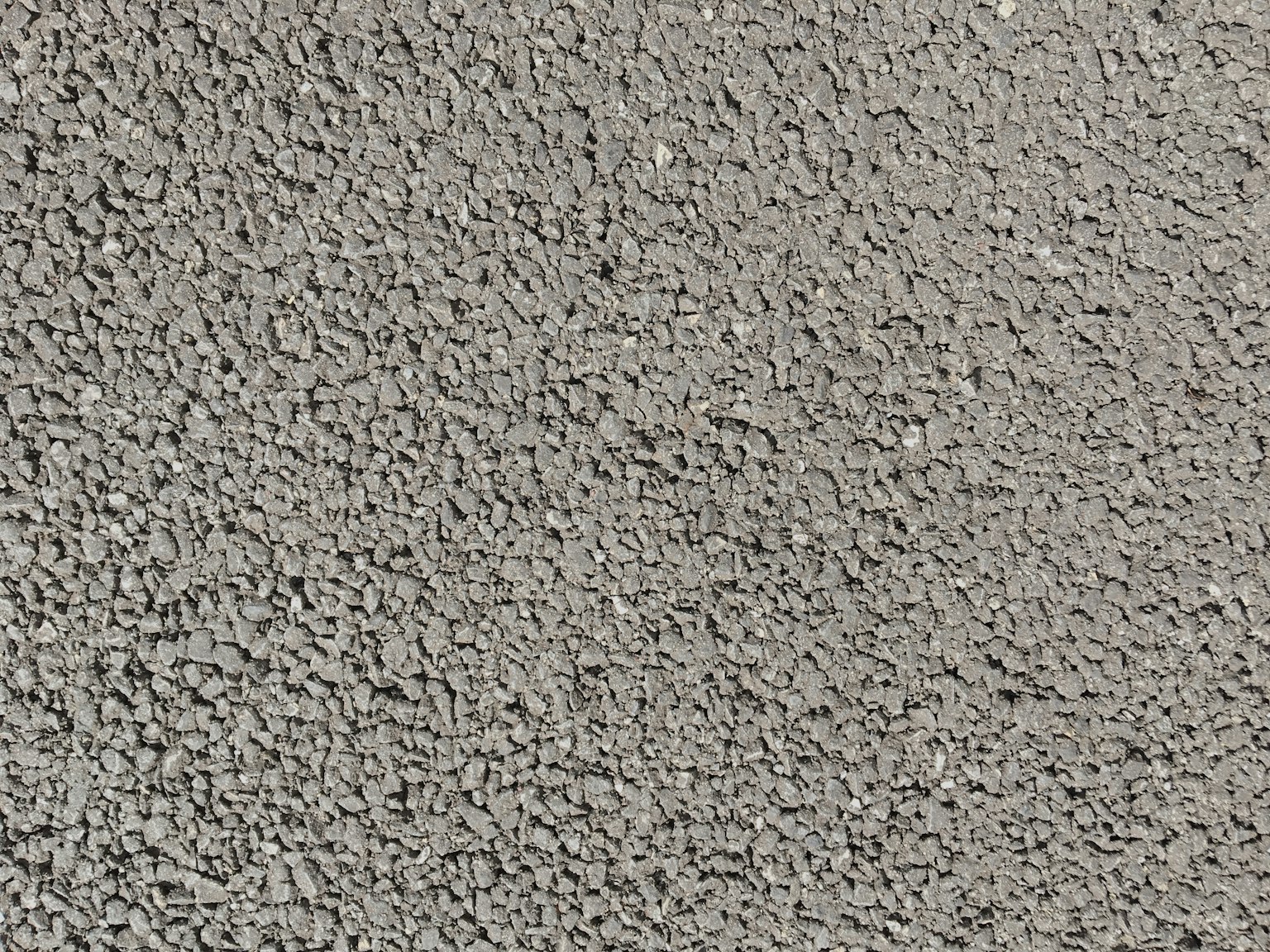 Textured gray surface with a rough appearance