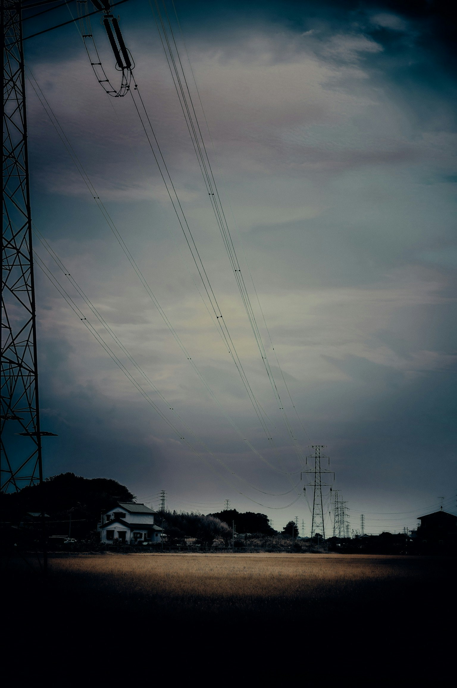 dusk sky over a wide rural field landscape