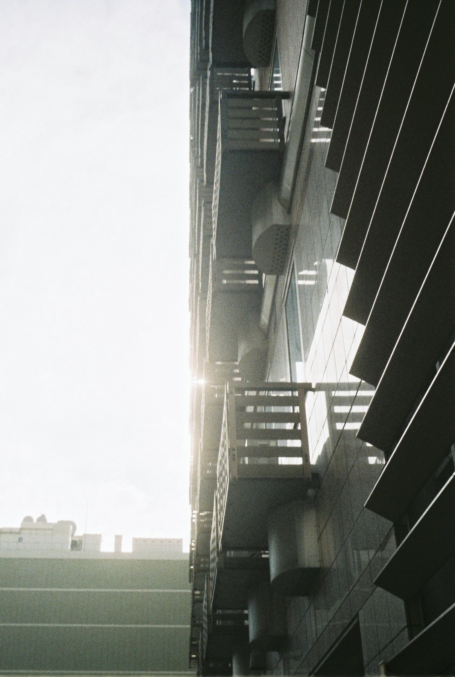 Image showing balconies and staircases on the side of a high-rise building