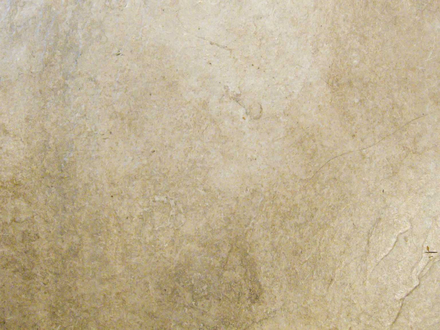 Surface en pierre texturée beige clair
