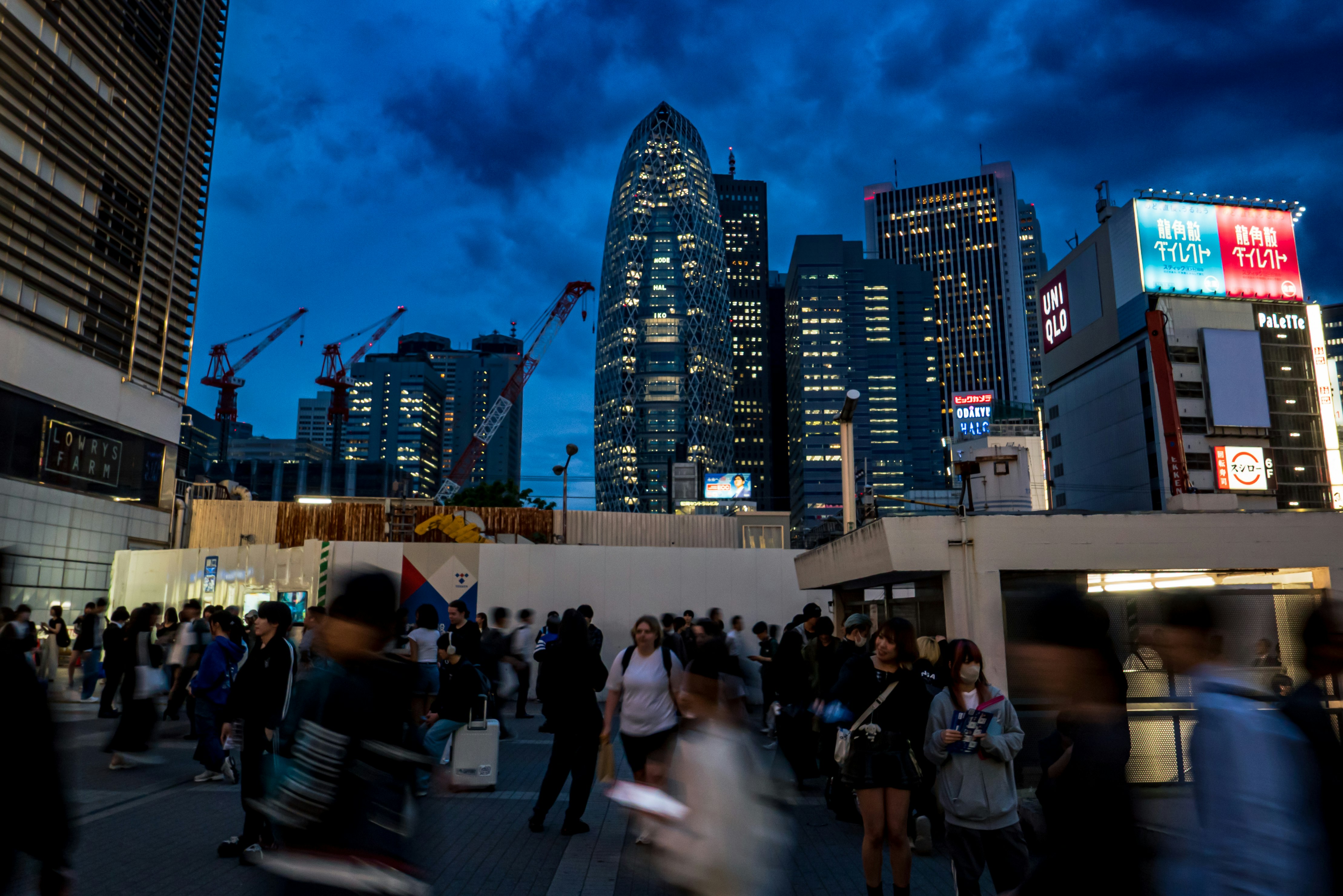 Shinjuku skyline with crowds in the evening cityscape