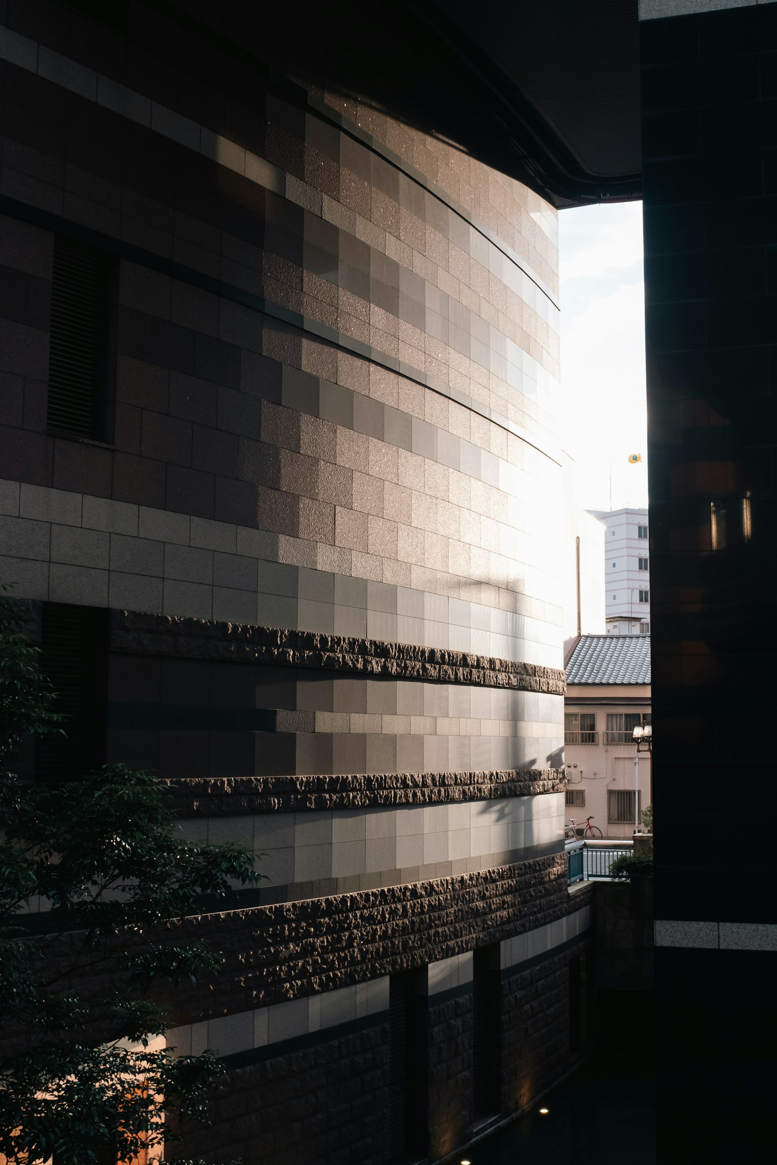 Image showing the side of a modern building with light reflecting off its surface