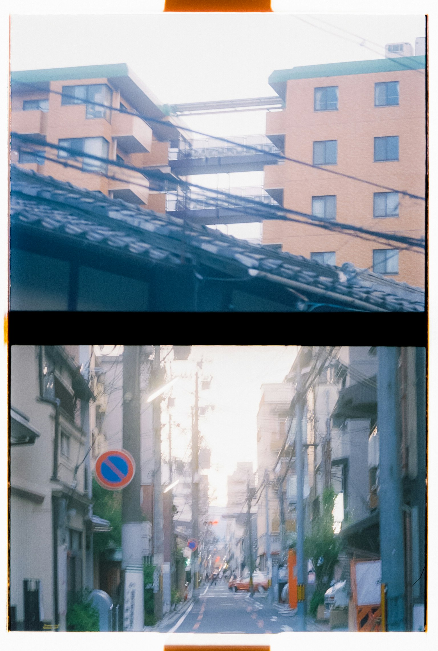 Cityscape featuring intersecting power lines and buildings