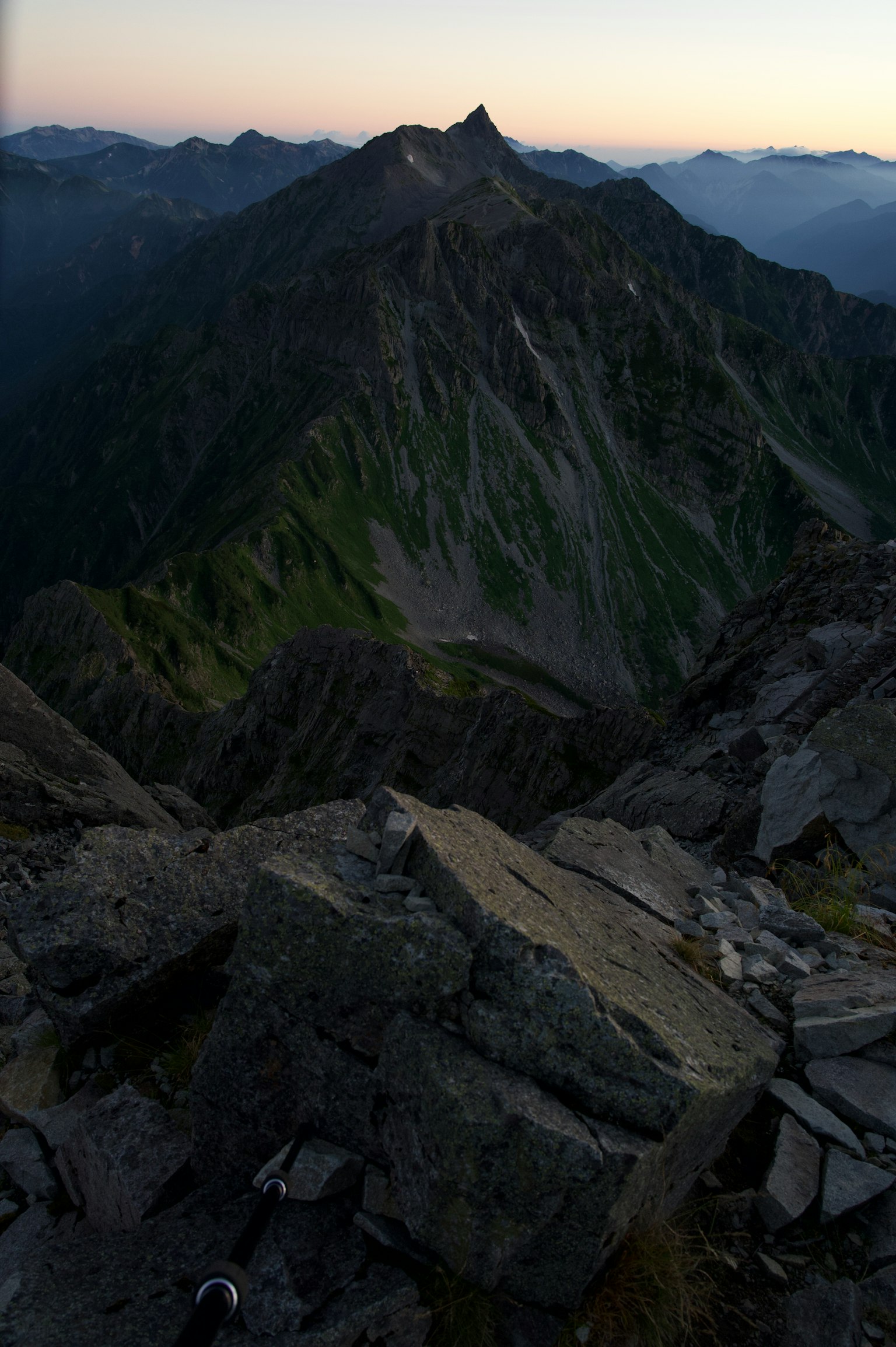Panoramic view from a mountain peak with rocky surface