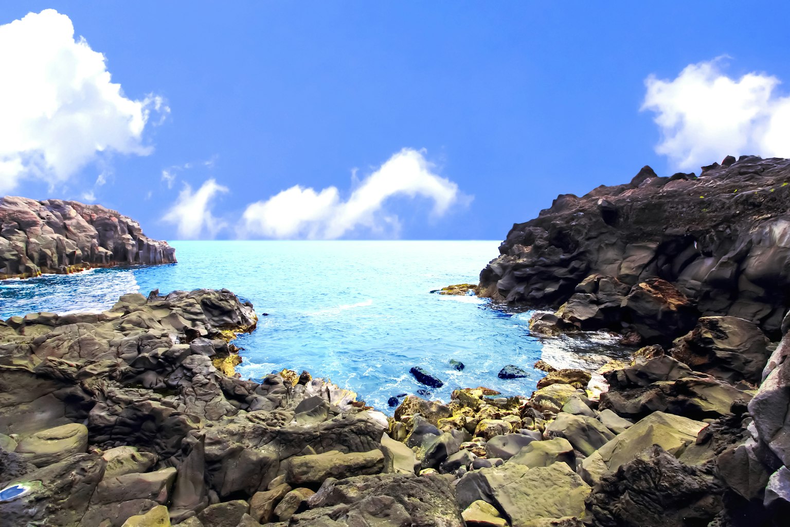 Beautiful coastal scene with blue sea and rocky shore
