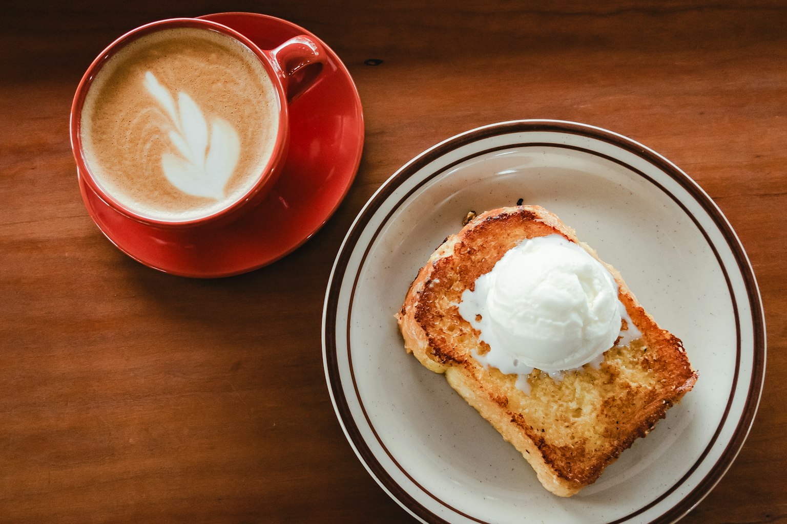 Image of toast topped with ice cream and a cup of coffee
