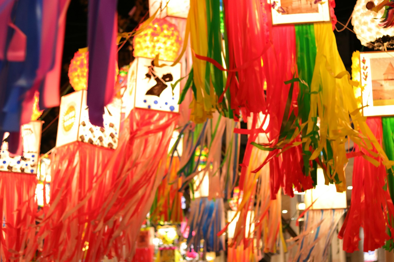 Colorful ribbons and decorations hanging in a festive scene