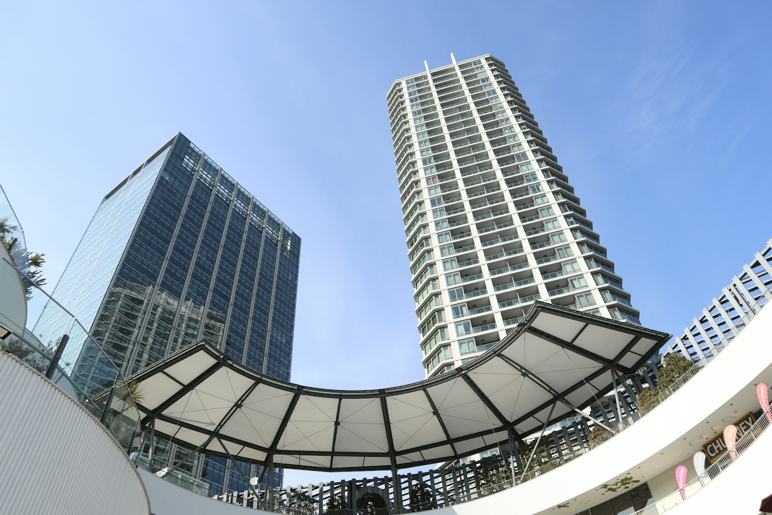 Urban landscape with skyscrapers and blue sky