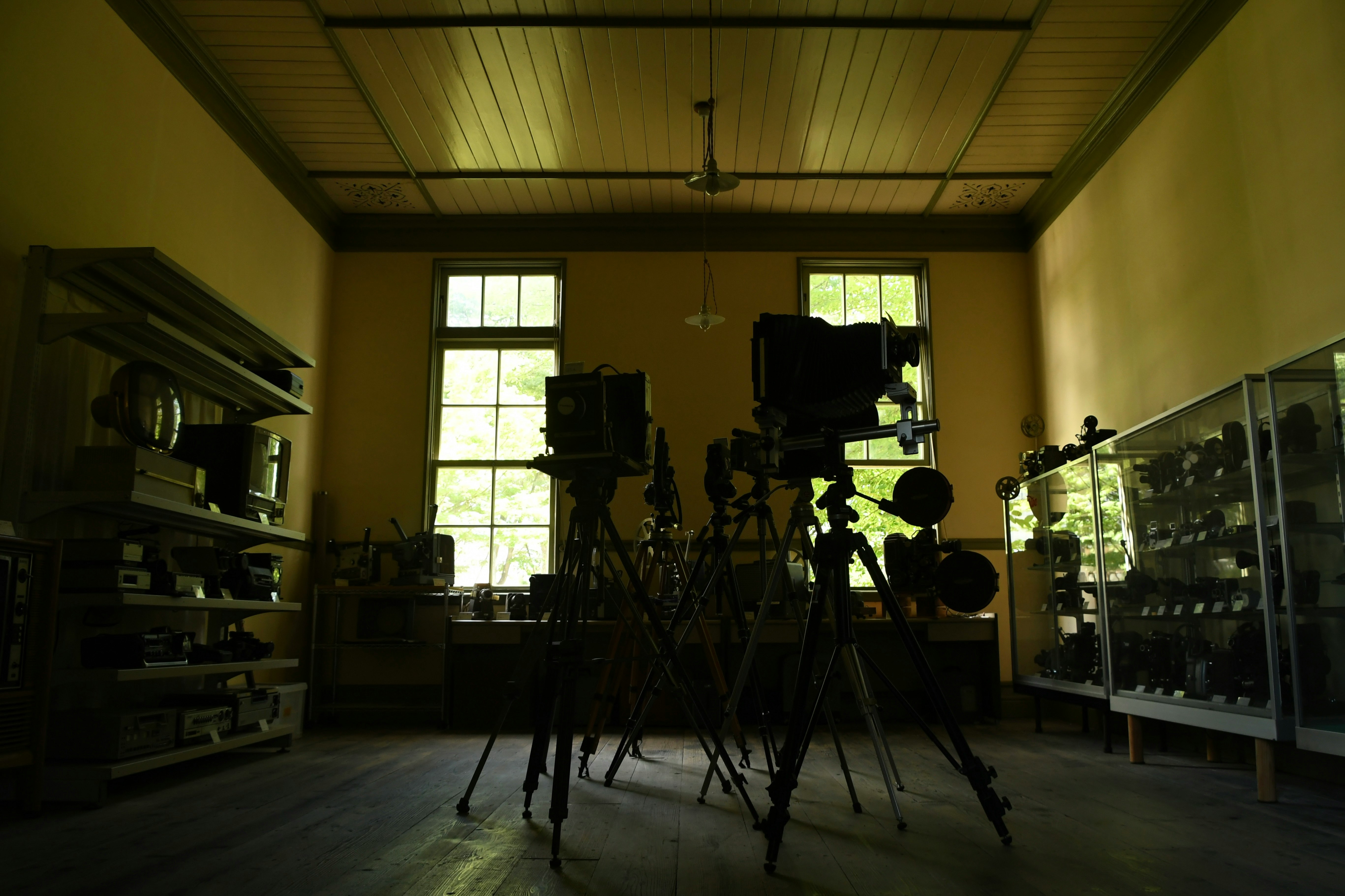 dim studio room with photography equipment lined up
