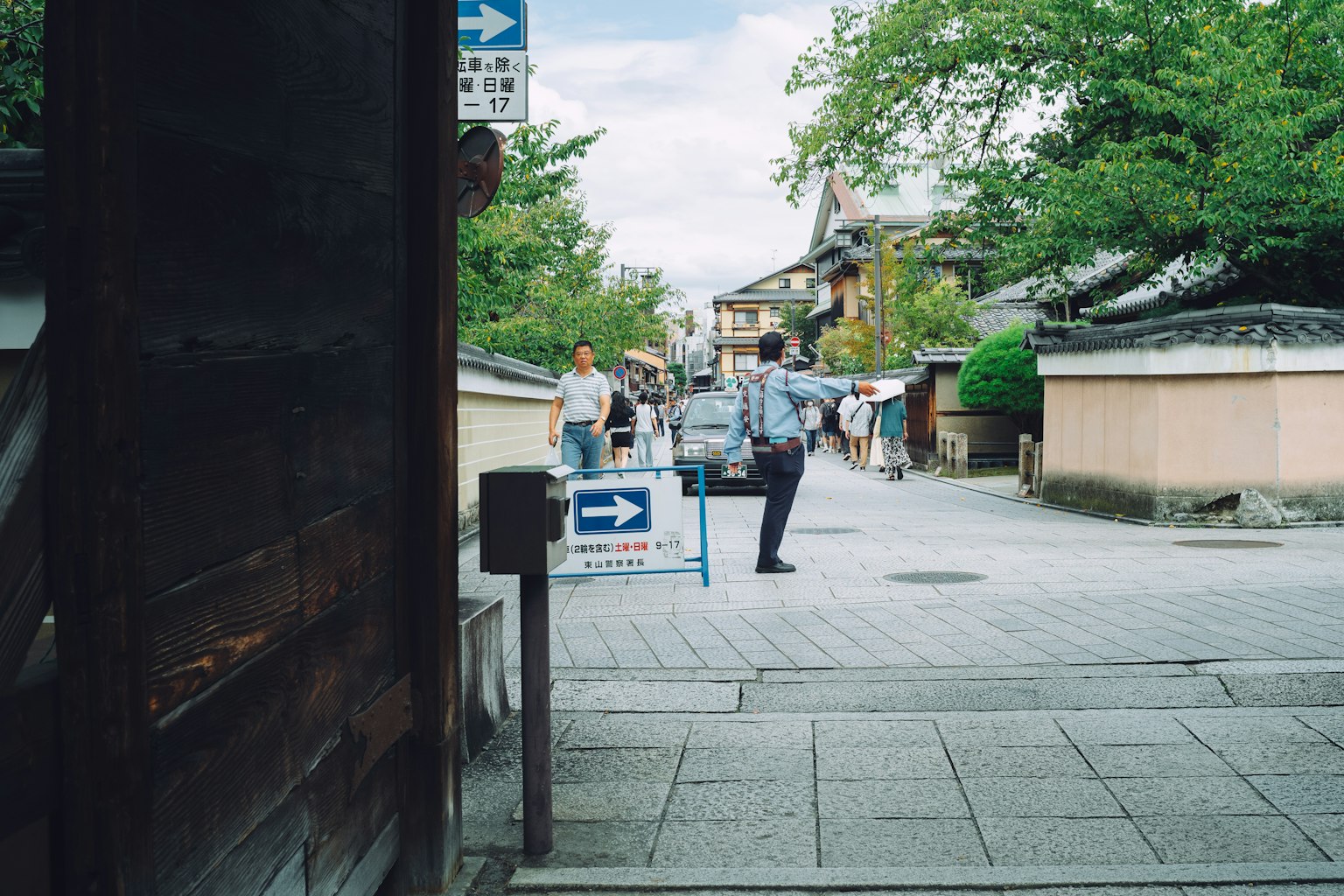 Quiet street scene capturing city life and interactions among people