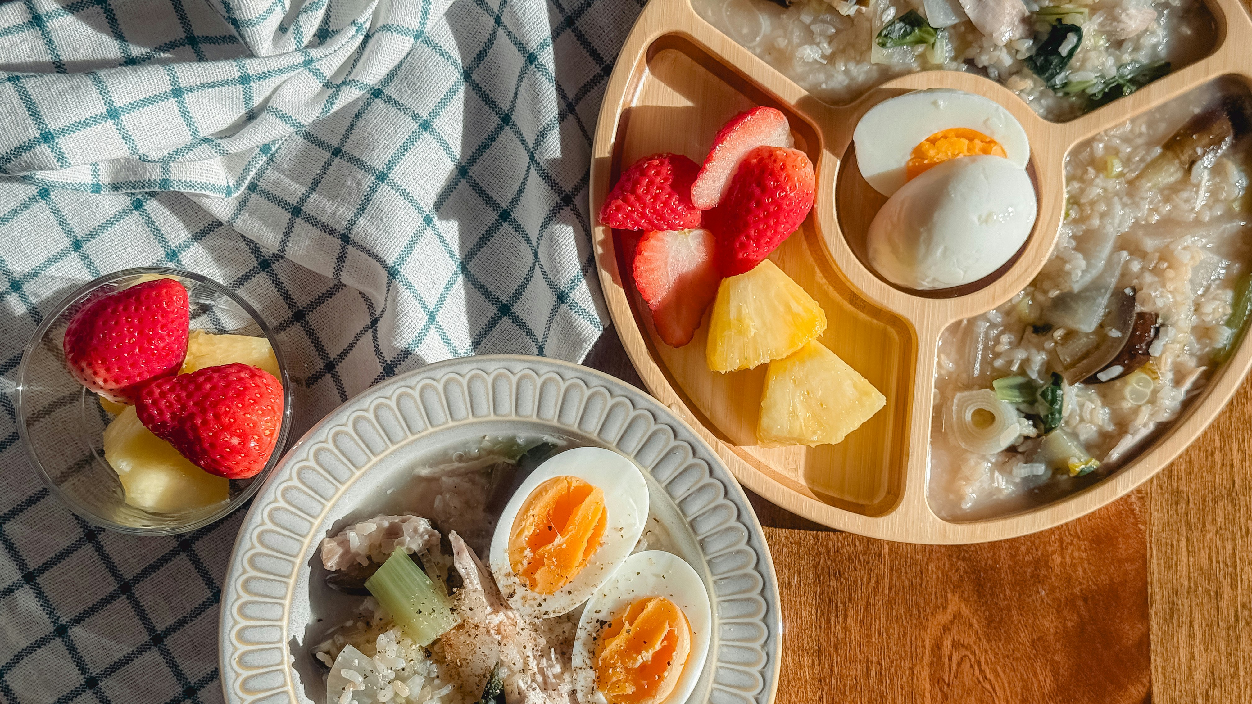 breakfast plate with strawberry heart and boiled eggs