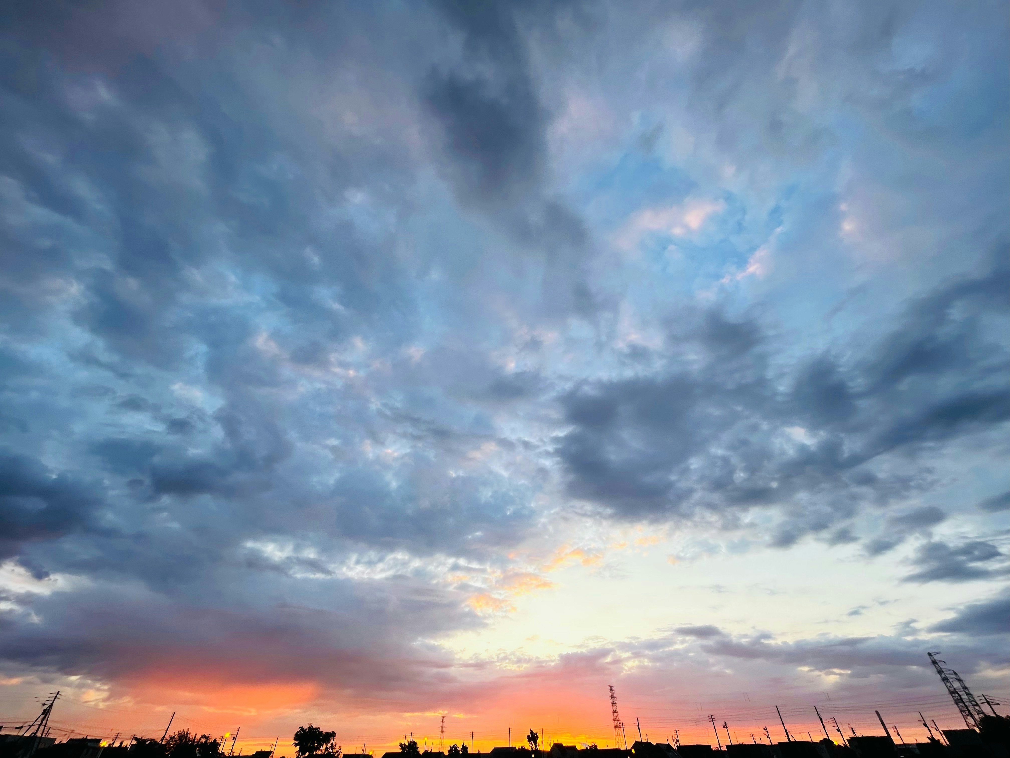 clouds over a sunrise sky with twilight glow