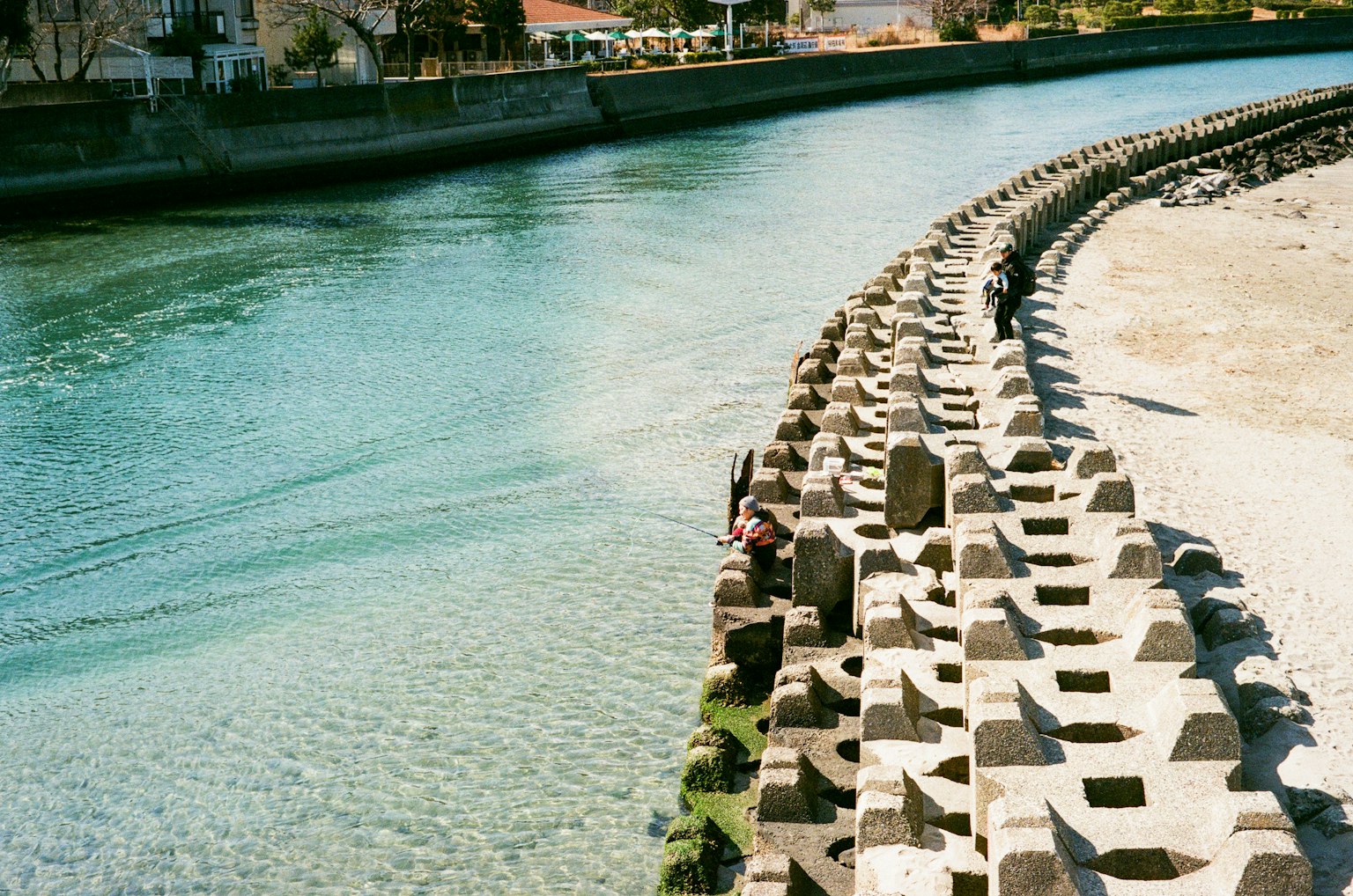 River landscape featuring clear water and a curving embankment