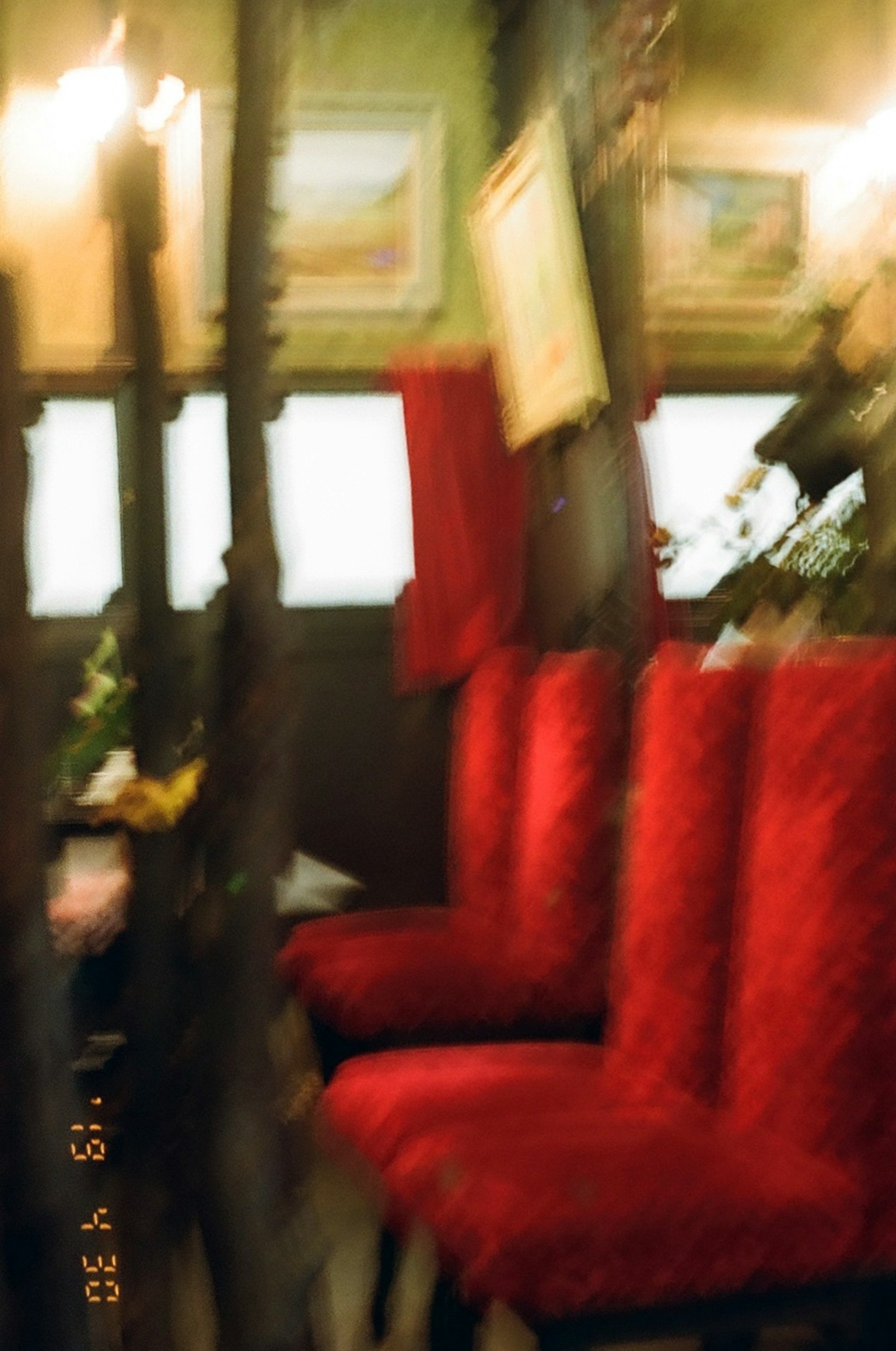 Interior with red chairs creating a warm atmosphere