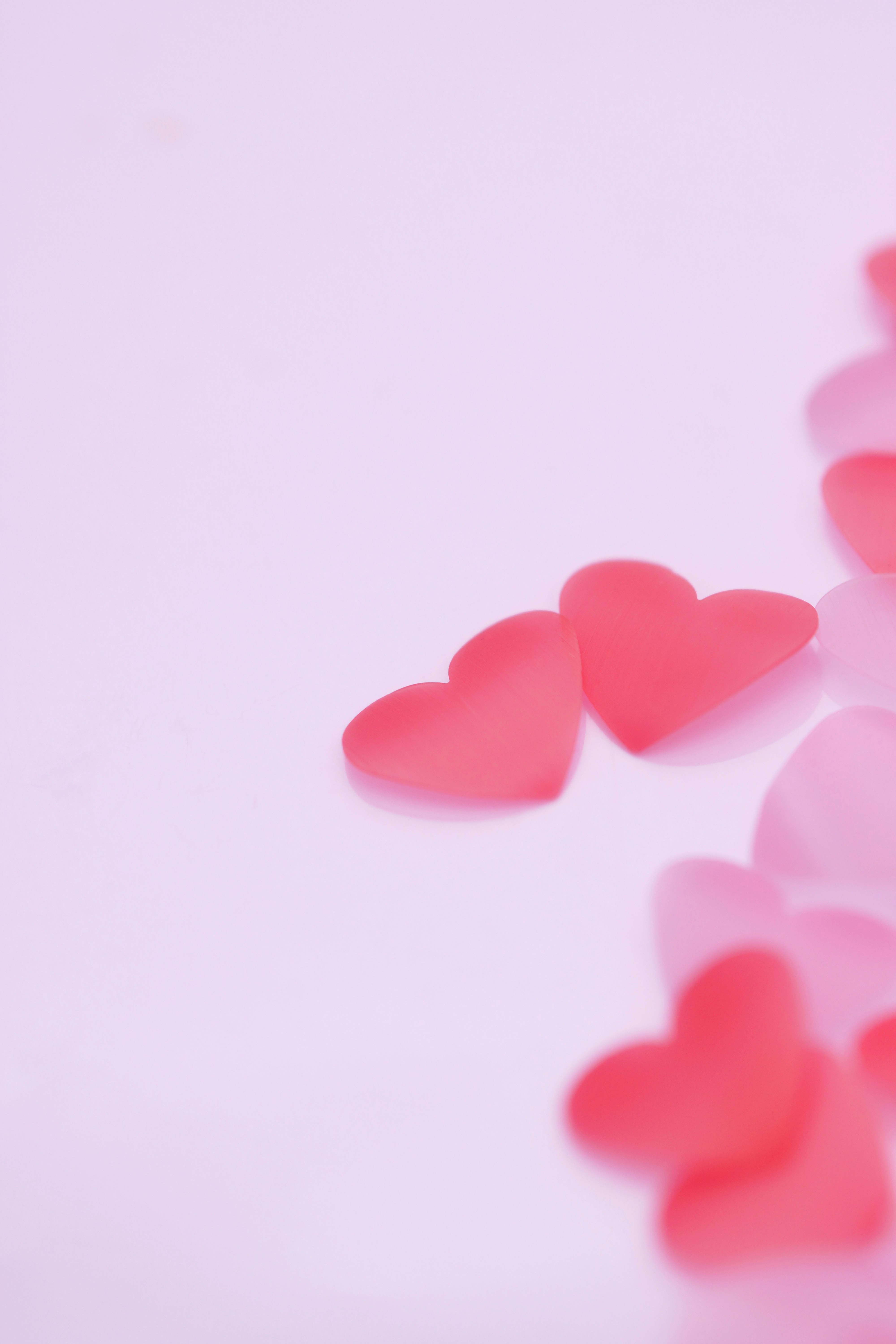 Pastel background with small heart decorations