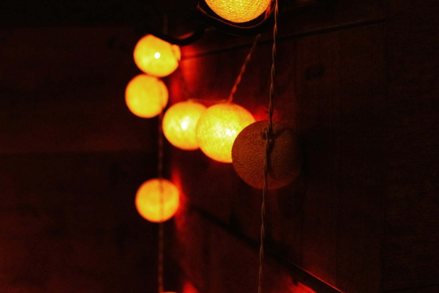 Warm decorative string lights in orange hues