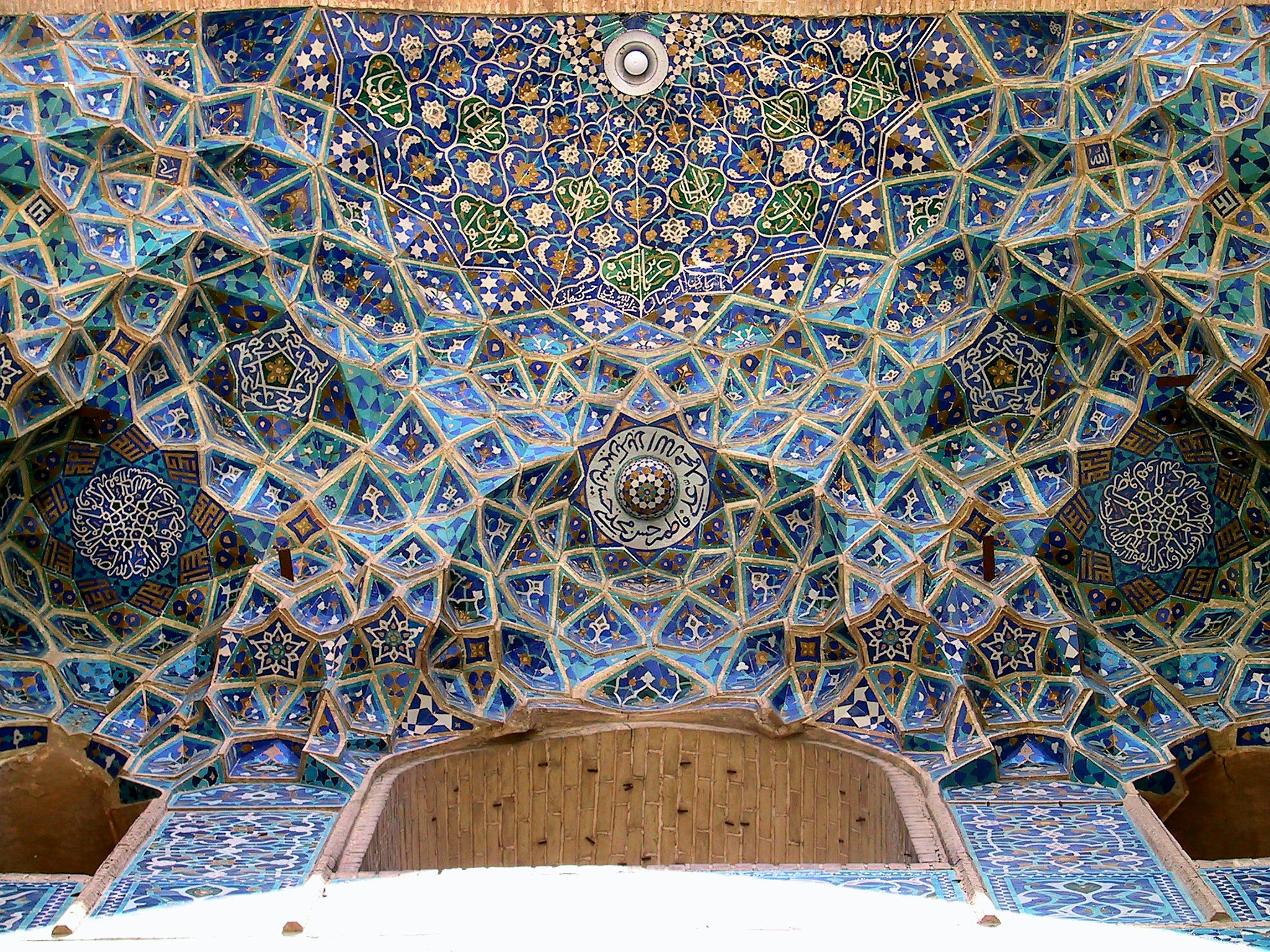 ceiling mosaic with blue and gold geometric patterns